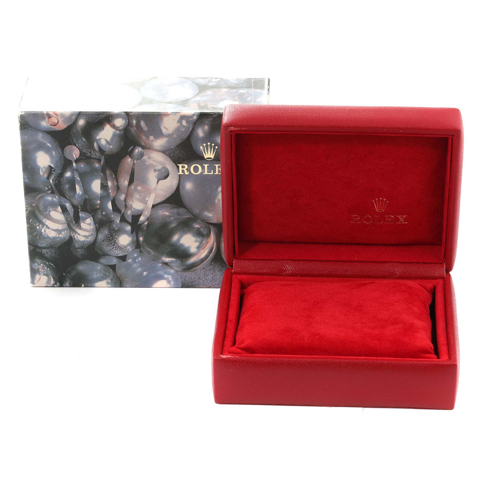 The image shows a red Rolex Datejust 79173 Women's Steel and Gold (two tone) Champagne Dial 79173 Women's Steel and Gold (two tone) Champagne Dial watch box and its outer packaging, both featuring the Rolex logo.