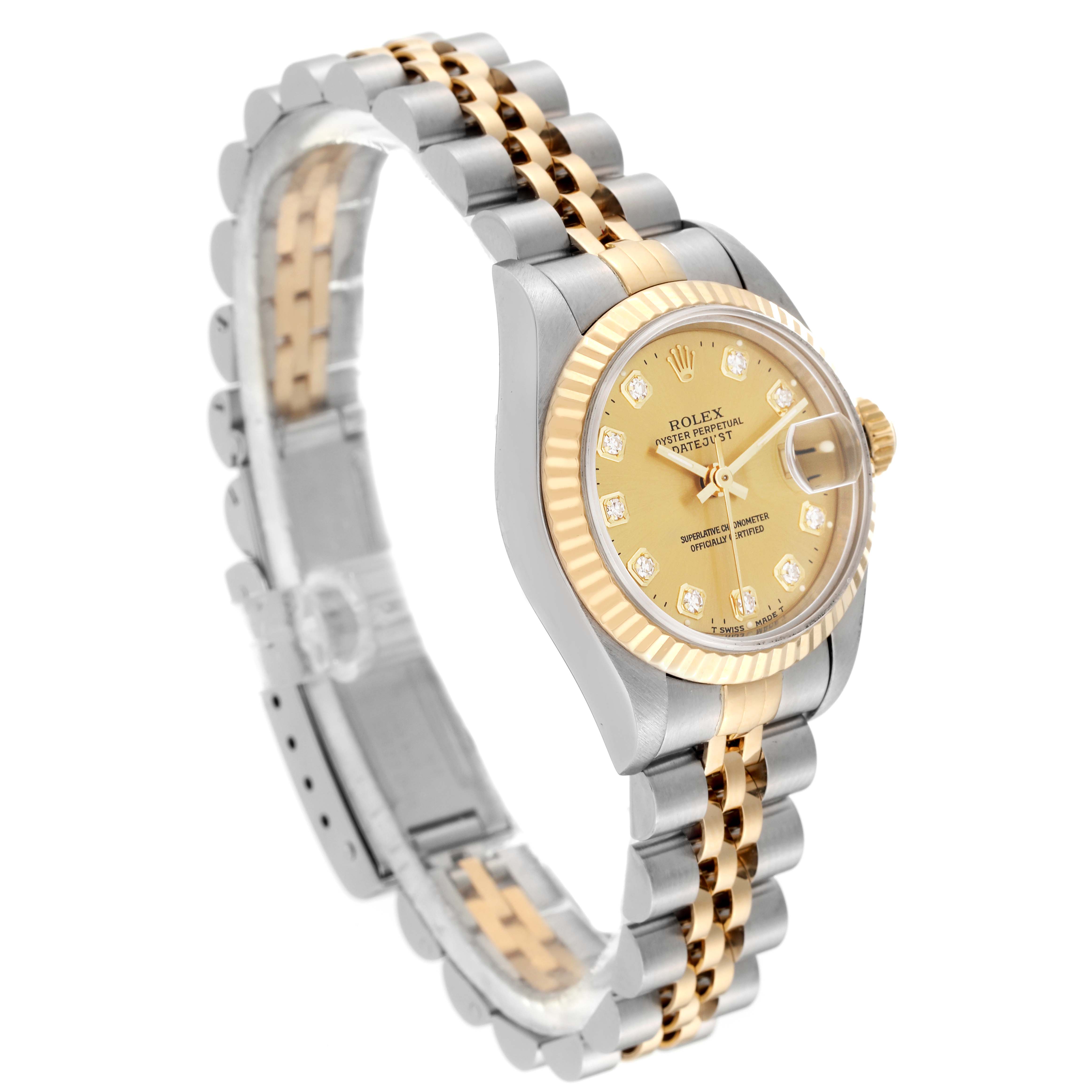 The image shows a Rolex Datejust 69173 Women's Steel and Gold (two tone) Champagne Dial 69173 Women's Steel and Gold (two tone) Champagne Dial watch at an angle highlighting its gold dial, fluted bezel, and two-tone bracelet.