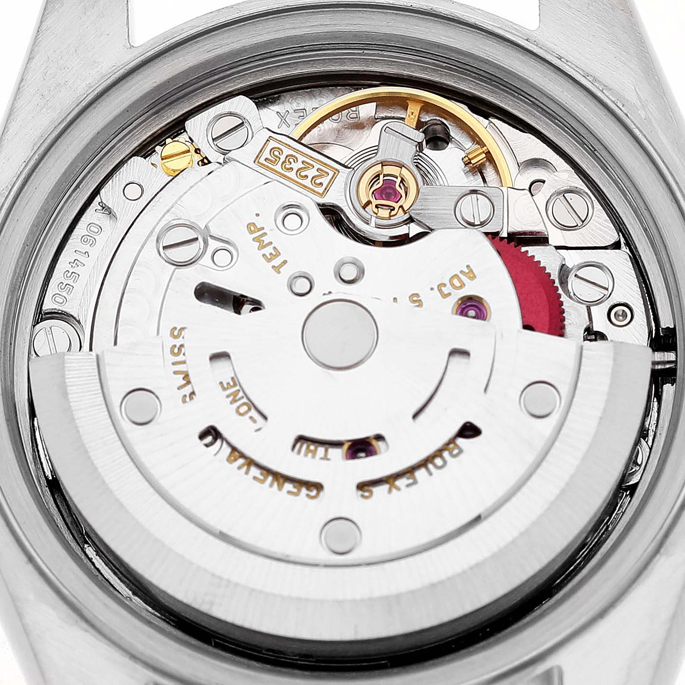 The image shows the movement of a Rolex Datejust 79173 Women's Steel and Gold (two tone) Champagne Dial, viewed from the back, highlighting the rotor and various mechanical components.