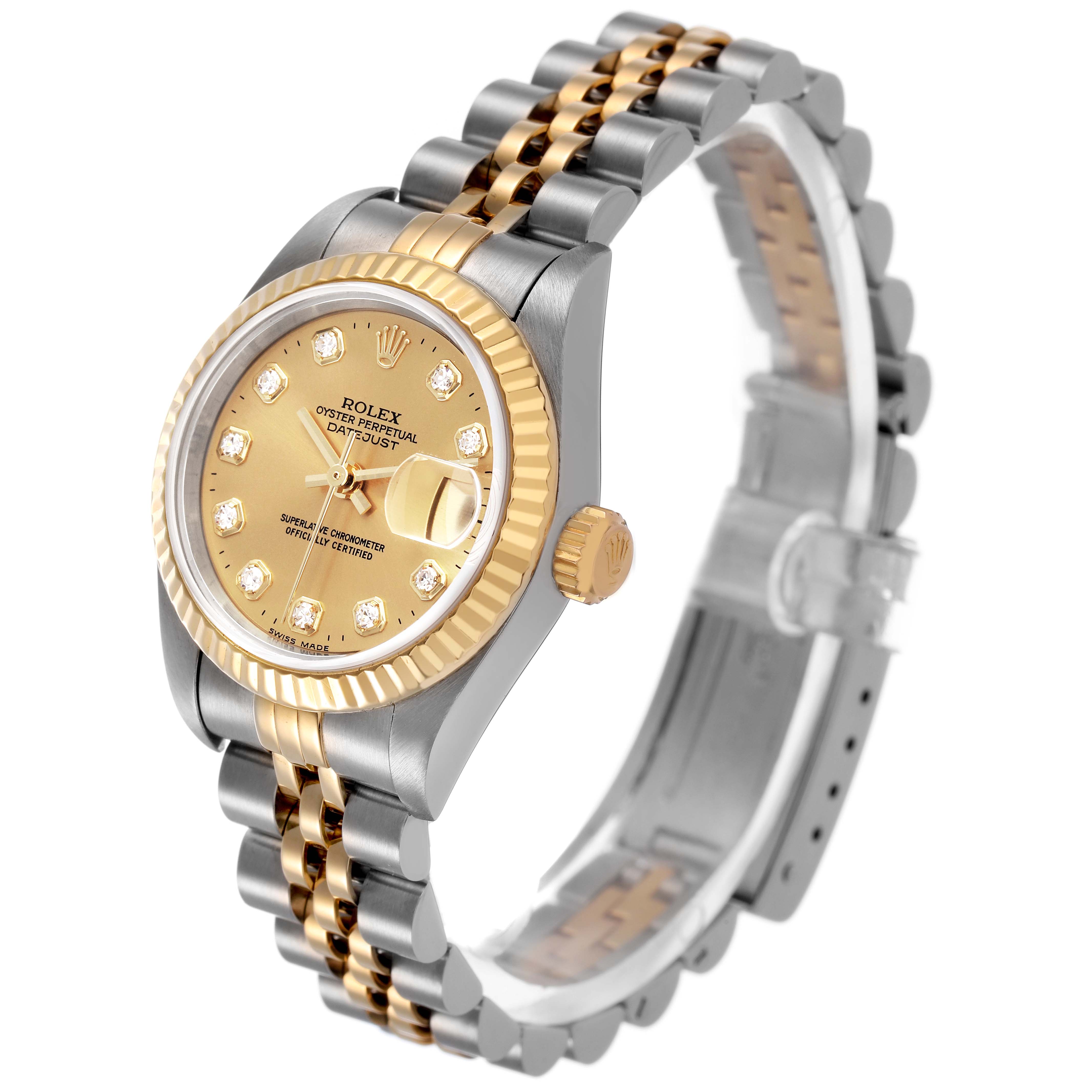 The Rolex Datejust 79173 Women's Steel and Gold (two tone) Champagne Dial watch is shown at an angled side view, displaying its gold dial, fluted bezel, and two-tone bracelet.
