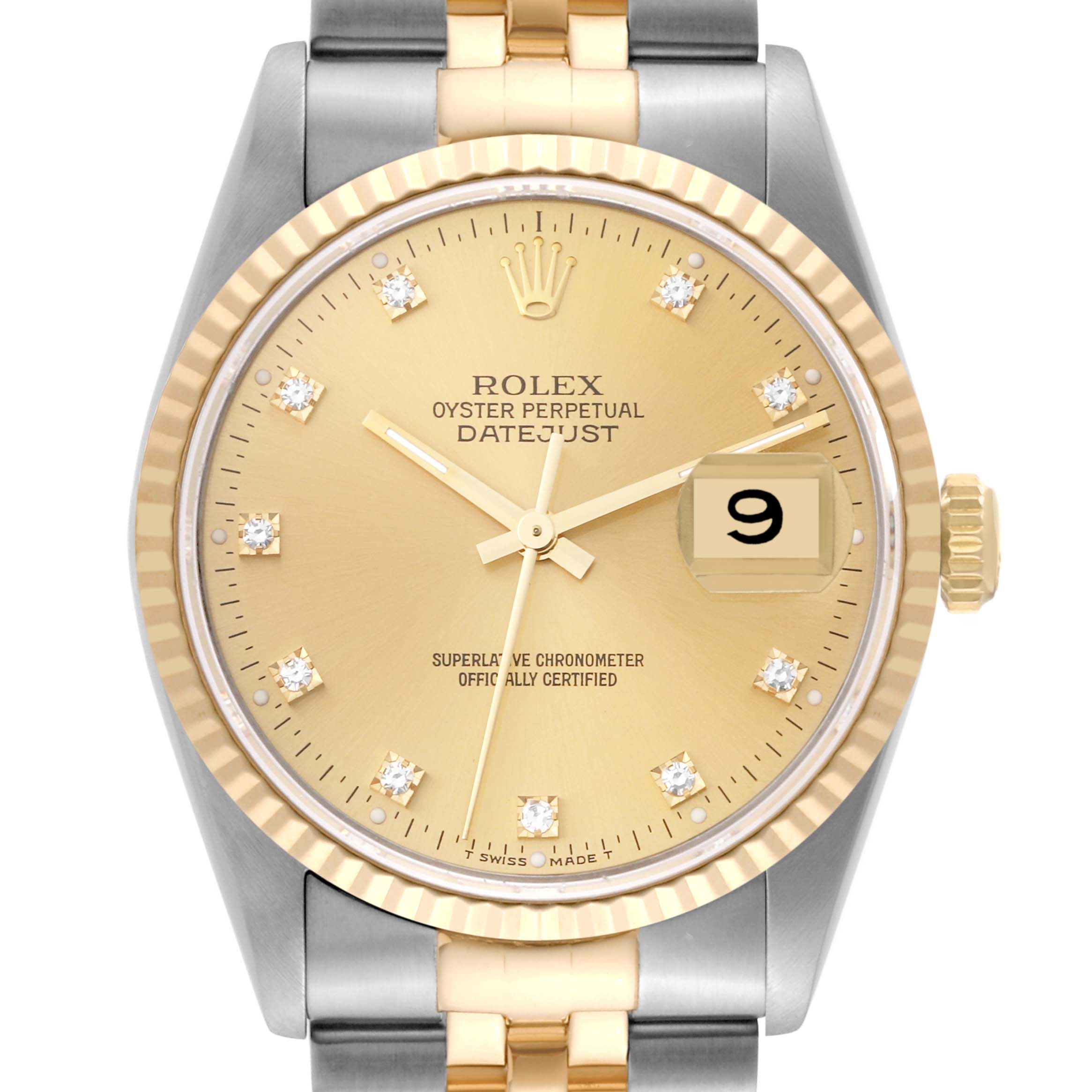This is a close-up view of the face of a Rolex Datejust 16233 Men's Steel and Gold (two tone) Champagne Dial 16233 Men's Steel and Gold (two tone) Champagne Dial watch, showing the dial, hands, date window, and fluted bezel.