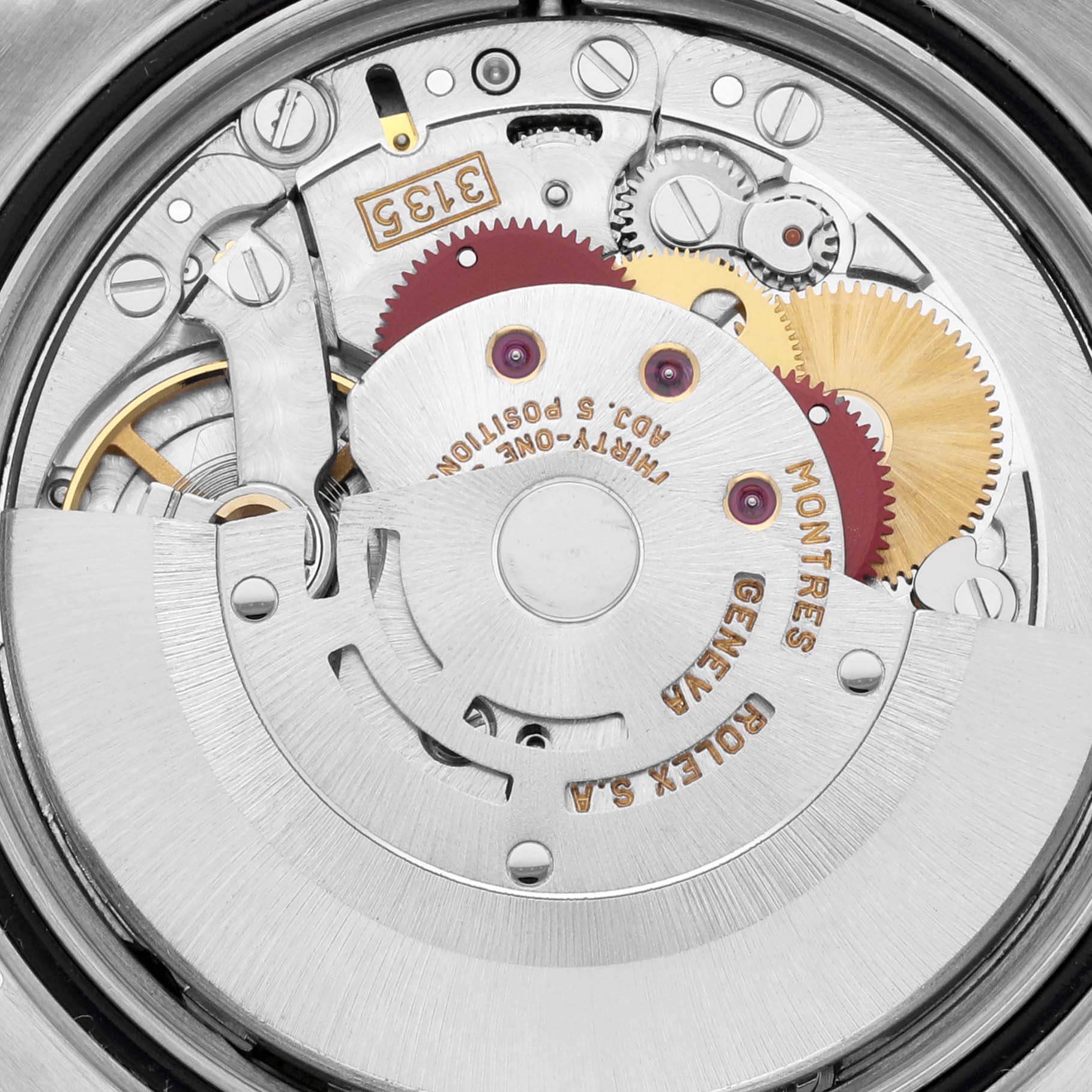 This image shows the intricate internal mechanics of a Rolex Datejust 16233 Men's Steel and Gold (two tone) Champagne Dial 16233 Men's Steel and Gold (two tone) Champagne Dial watch, highlighting gears and the rotor.