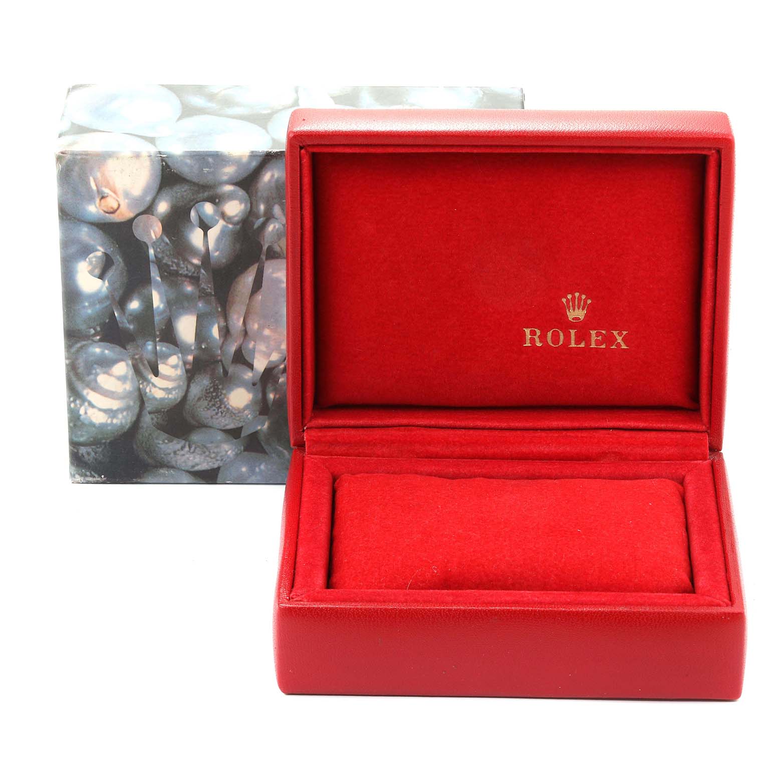 A red Rolex Datejust 69173 Women
s Steel and Gold (two tone) Champagne Dial 69173 Women
s Steel and Gold (two tone) Champagne Dial watch box is displayed, showing the cushion and interior with the Rolex logo.