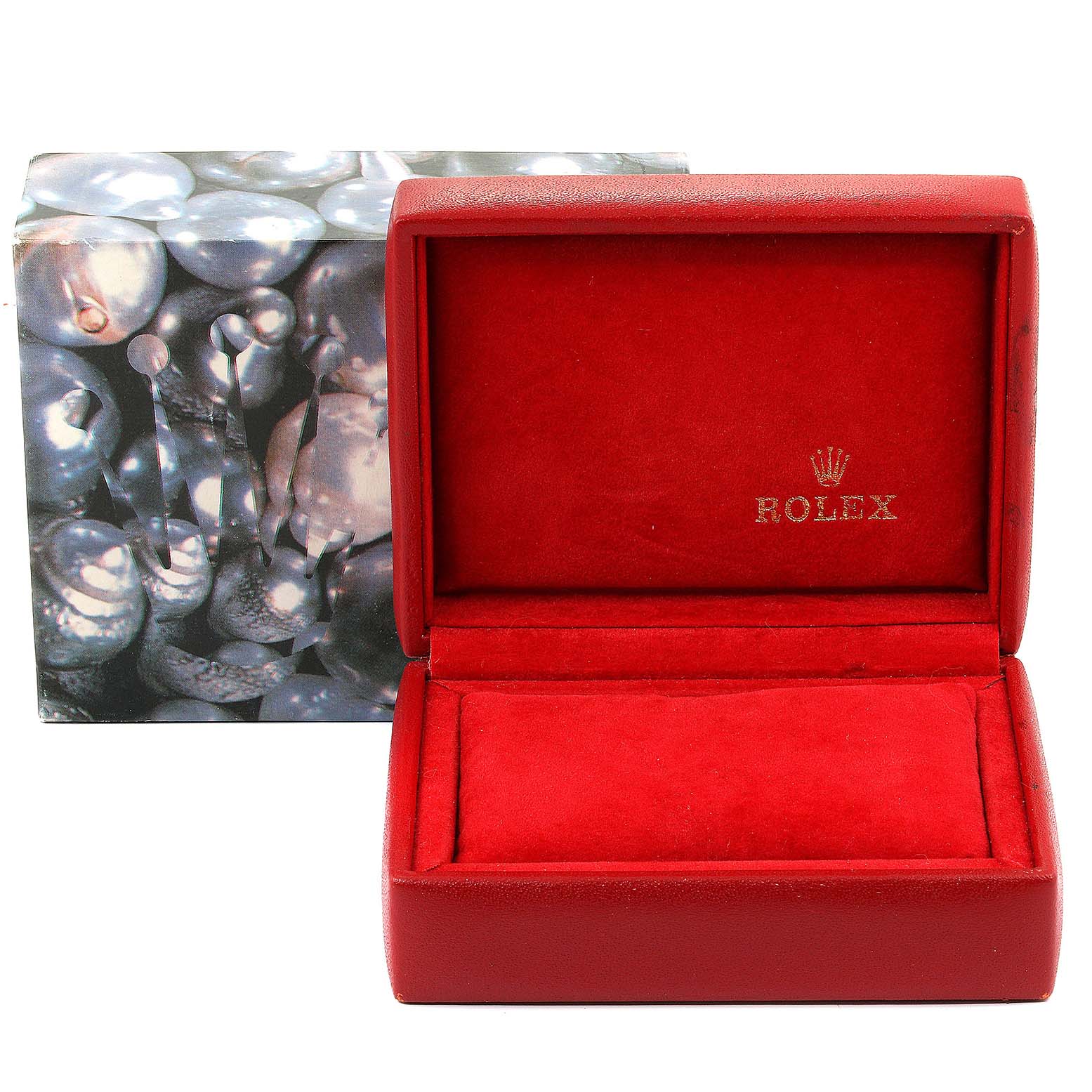 This image shows a red Rolex box for the Datejust model, with the box's lid open, revealing the red interior.