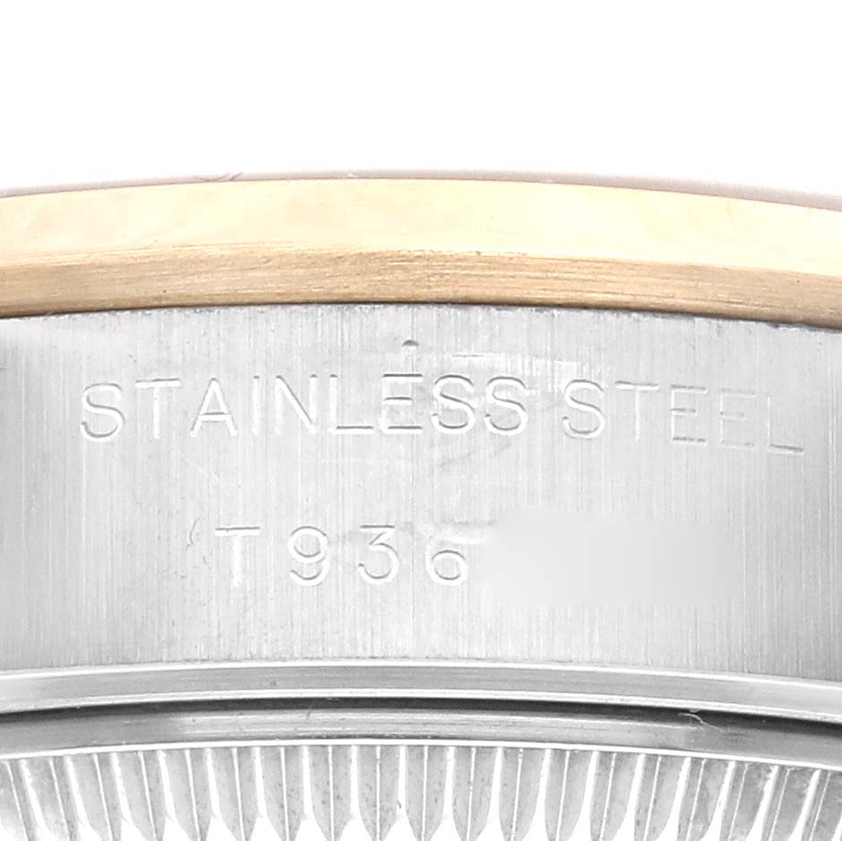 The image shows a close-up of the stainless steel case side and part of the bezel of a Rolex Datejust 69163 Women's Steel and Gold (two tone) Grey Dial 69163 Women's Steel and Gold (two tone) Grey Dial watch.