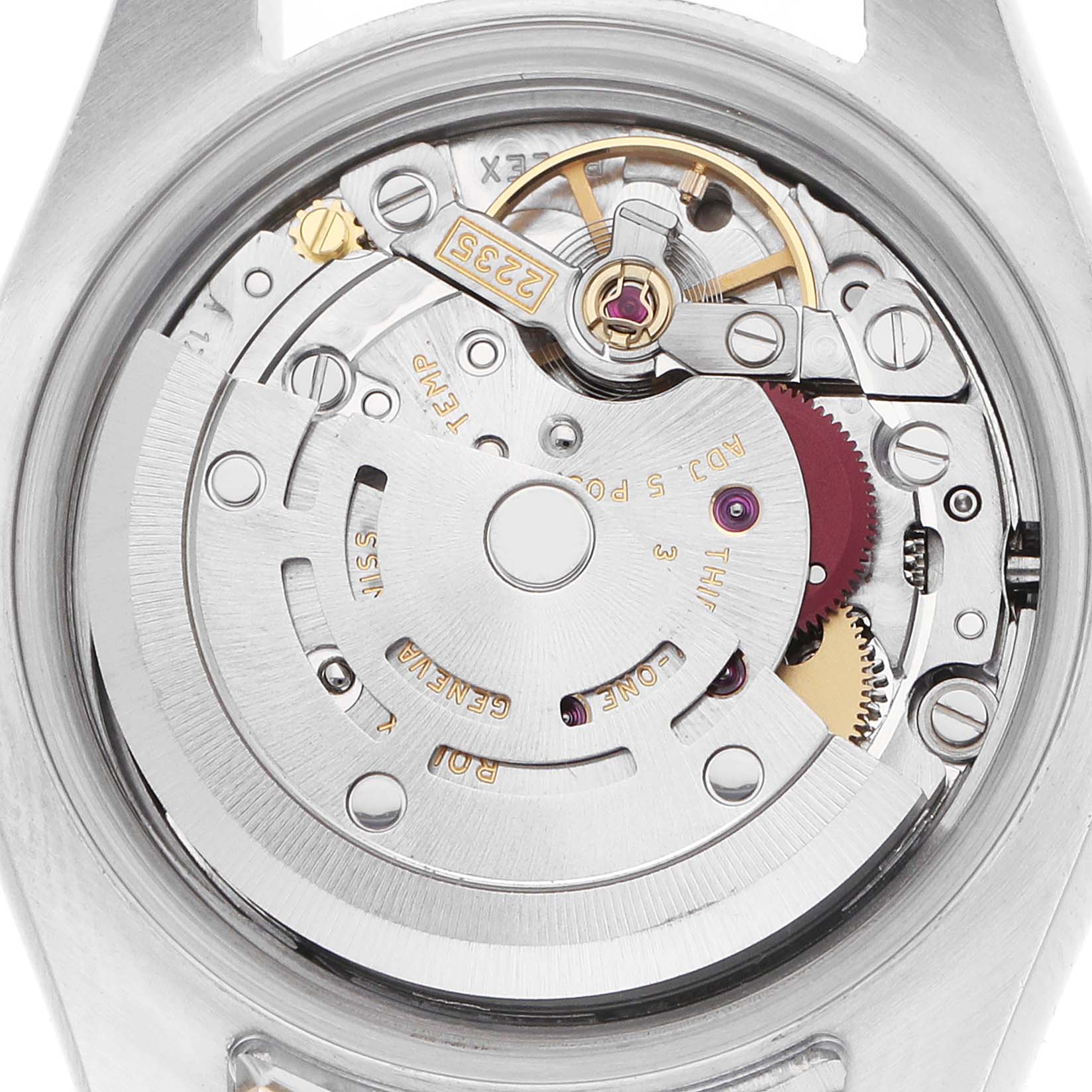 The image shows a close-up view of the movement inside a Rolex Datejust 179163 Women
s Steel and Gold (two tone) Silver Dial, highlighting its intricate mechanical components.