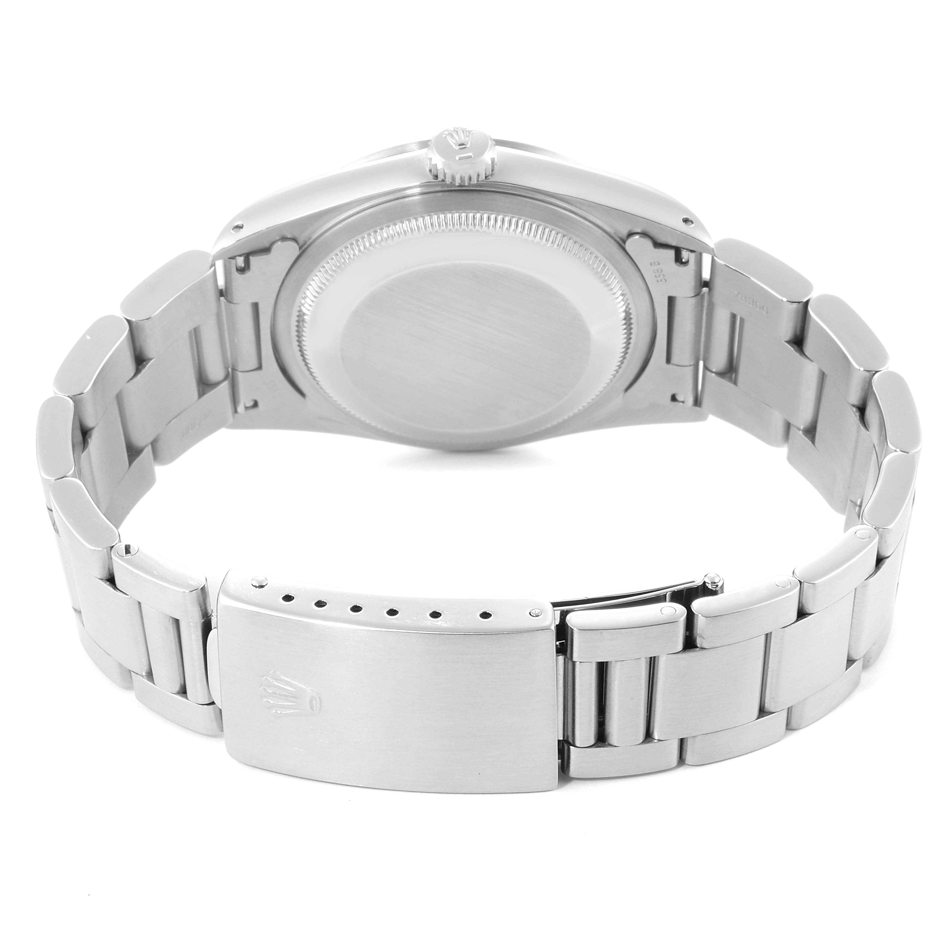 The image shows the back case and bracelet of the Rolex Datejust 16200 Men's Stainless Steel White Dial 16200 Men's Stainless Steel White Dial model, including the clasp with the Rolex logo.