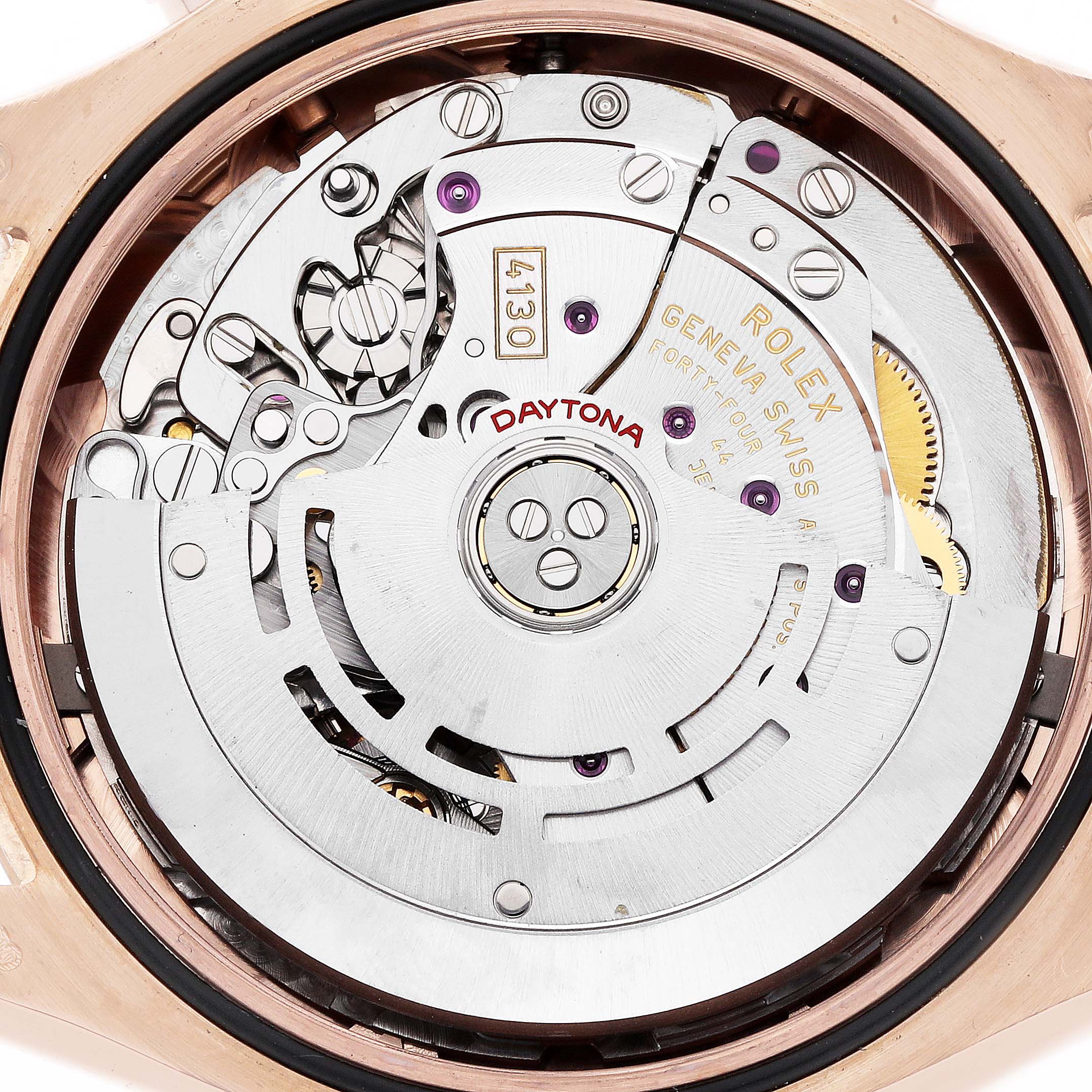 The image shows the movement and inner mechanics of a Rolex Daytona 116505 Men's Rose Gold Brown Dial watch from a top-down angle.