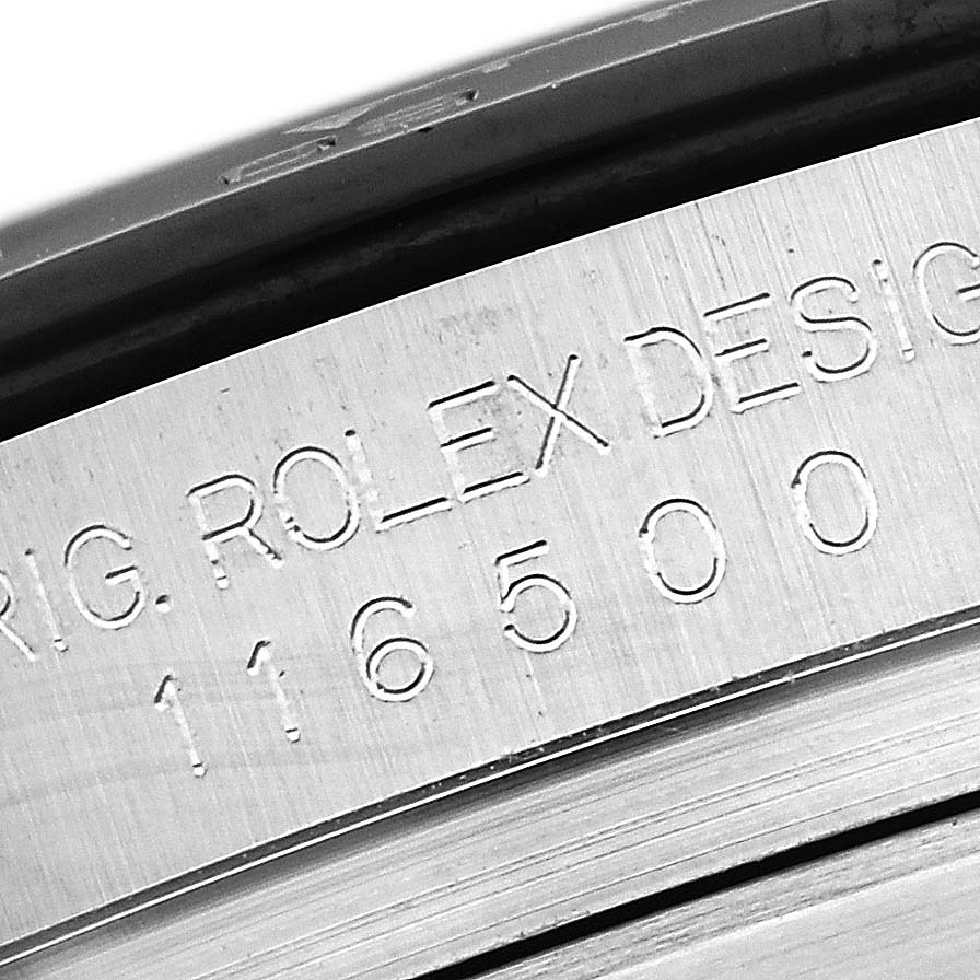 An extreme close-up of the engraved side showing the serial number and "Rolex Designs" text on the Rolex Daytona 116500LN Men's Stainless Steel White Dial 116500LN Men's Stainless Steel White Dial watch.