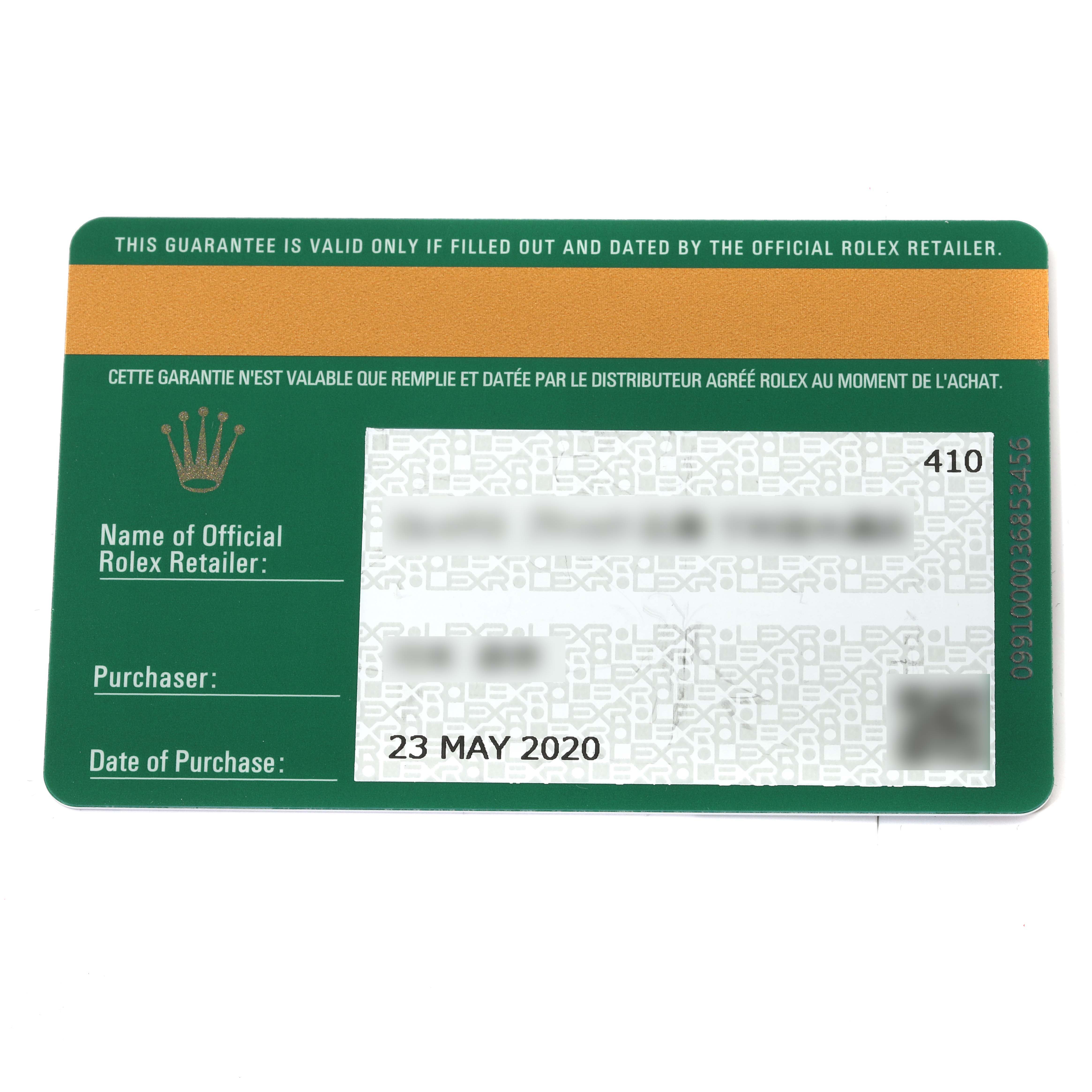 This image shows the warranty card for a Rolex Daytona 116500LN Men's Stainless Steel White Dial 116500LN Men's Stainless Steel White Dial watch, including the purchase date and retailer information.