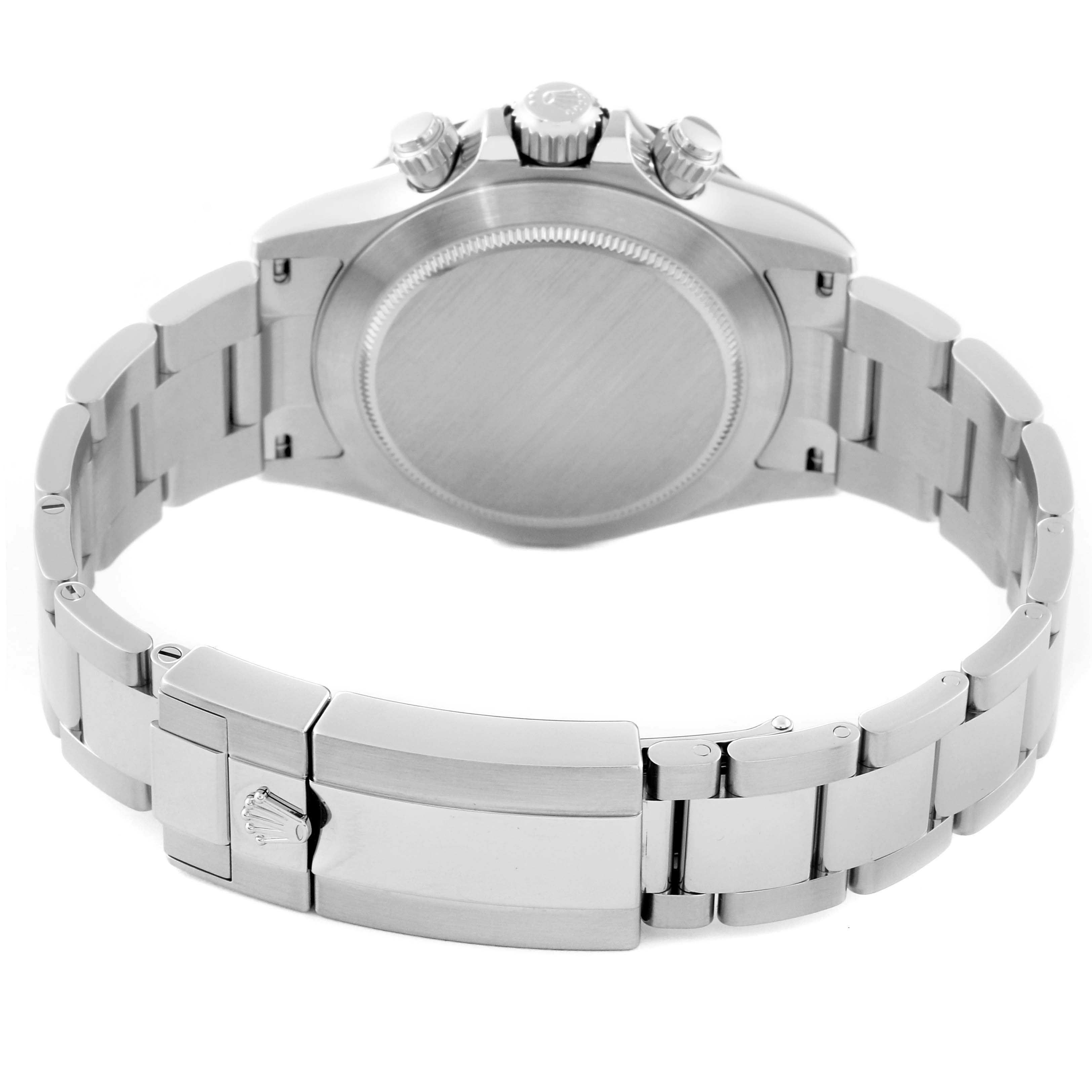 The image shows the backside and clasp of a Rolex Daytona 116500LN Men's Stainless Steel White Dial 116500LN Men's Stainless Steel White Dial watch, highlighting its stainless steel case and bracelet.