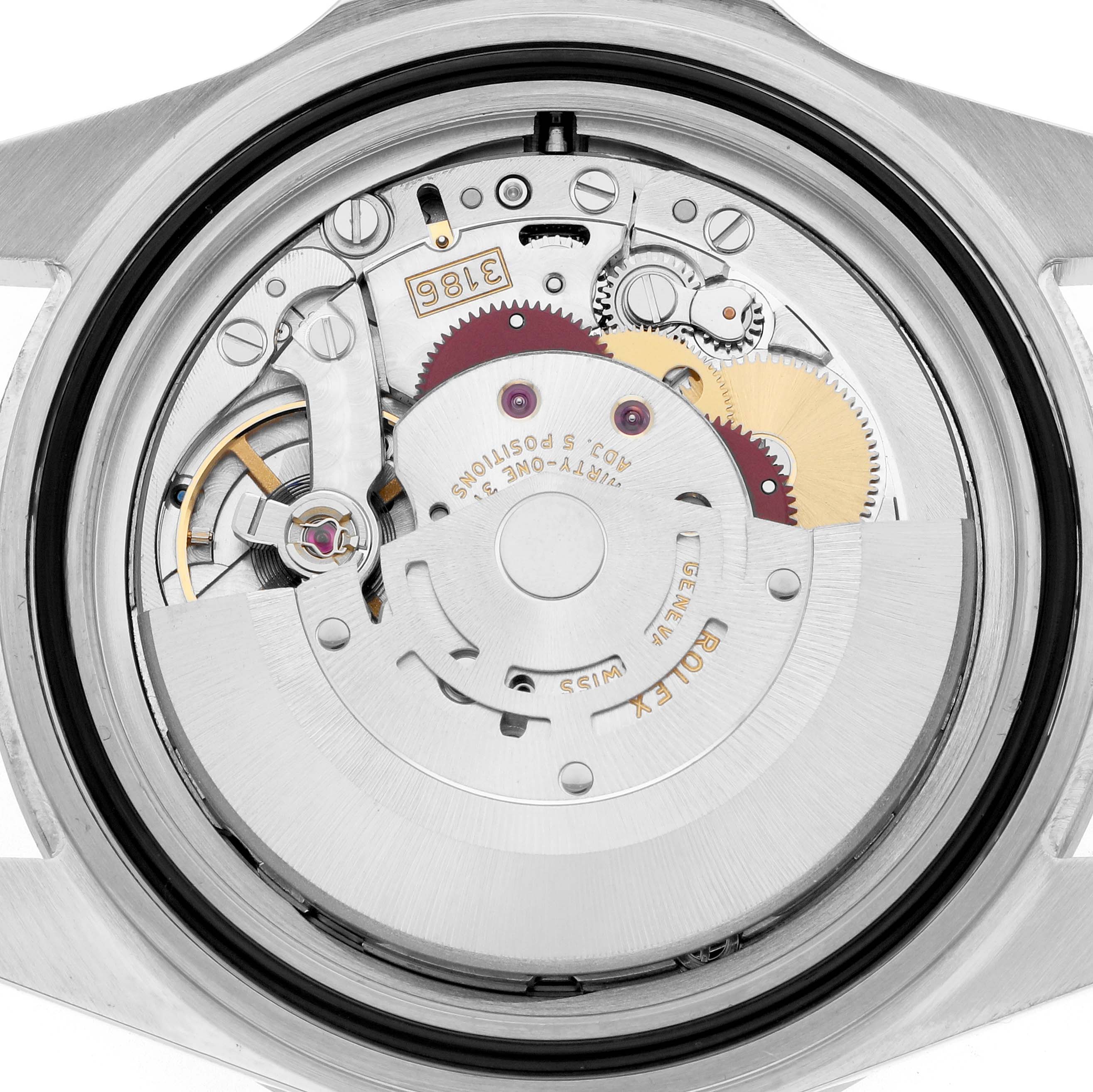 The image shows the intricate movement mechanism of a Rolex Explorer 216570 Men
s Stainless Steel Black Dial watch from a rear angle.