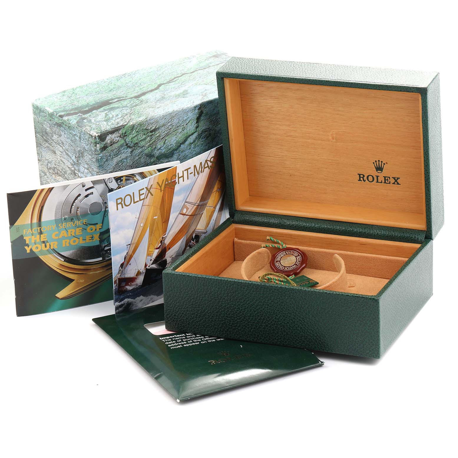 Photographed is an open Rolex Explorer 16570 Men's Stainless Steel Black Dial 16570 Men's Stainless Steel Black Dial watch box with accompanying literature and tags, showing packaging and documentation.