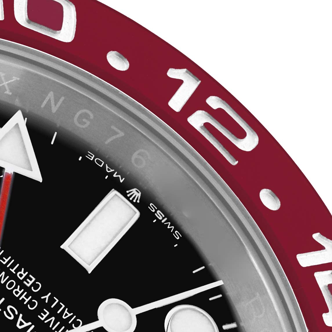 The image shows a close-up of the red bezel and part of the dial of a Rolex GMT-Master 126710 Men
s Stainless Steel Black Dial, highlighting details like the "12" marker.