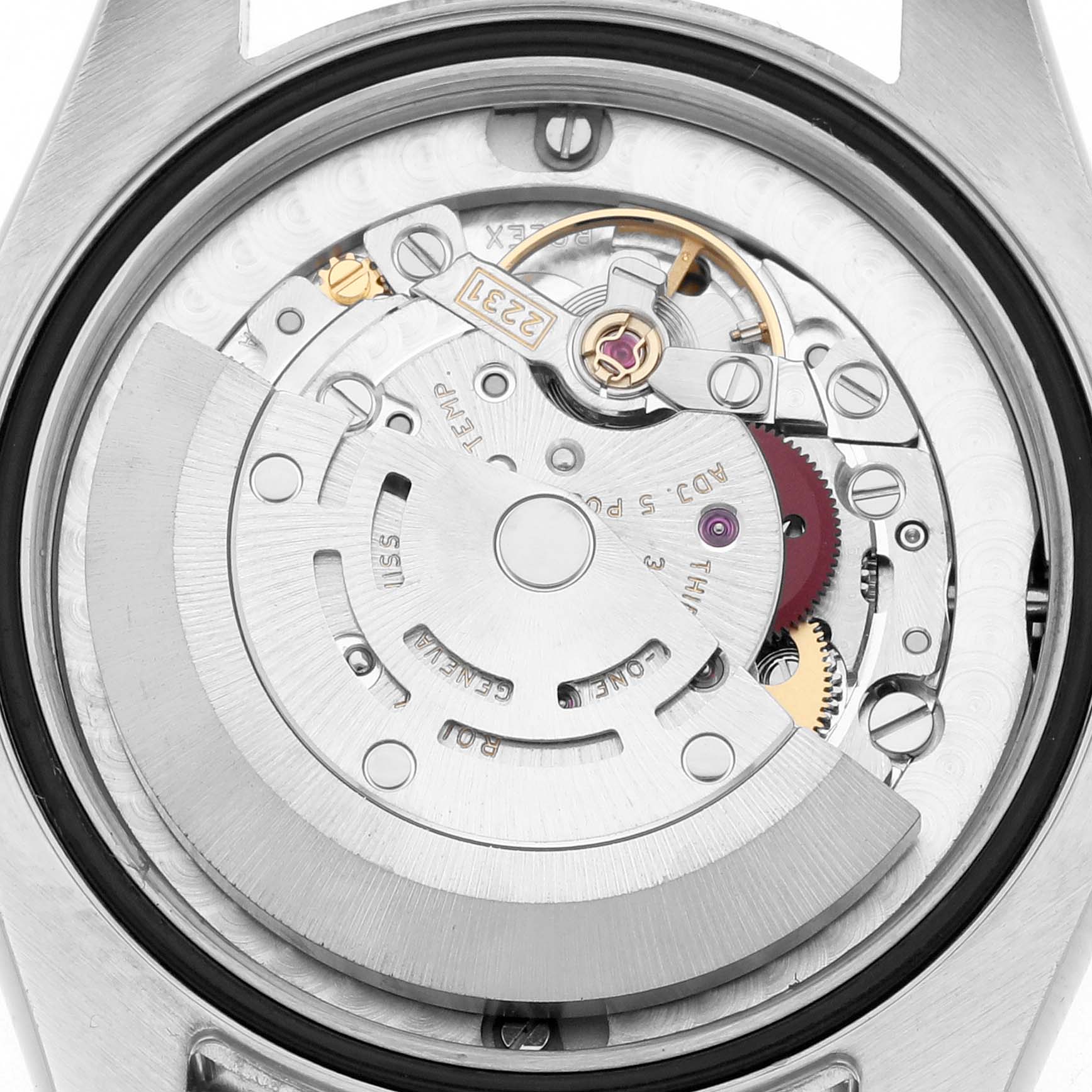 The image shows the back view of a Rolex Mid-Size 177234 Women
s Stainless Steel Black Dial watch, highlighting the movement and rotor mechanism.
