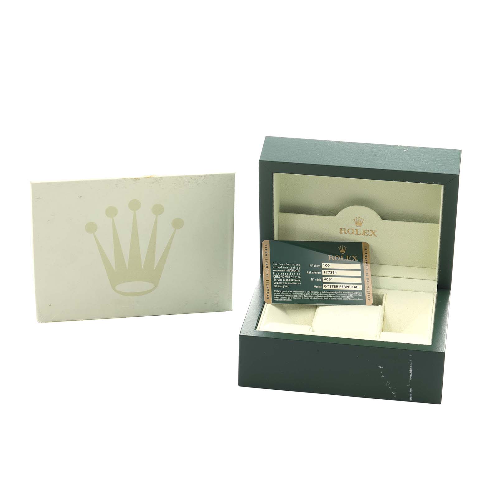The image shows a Rolex Mid-Size 177234 Women
s Stainless Steel Black Dial model watch box open with a warranty card, alongside an outer box lid.