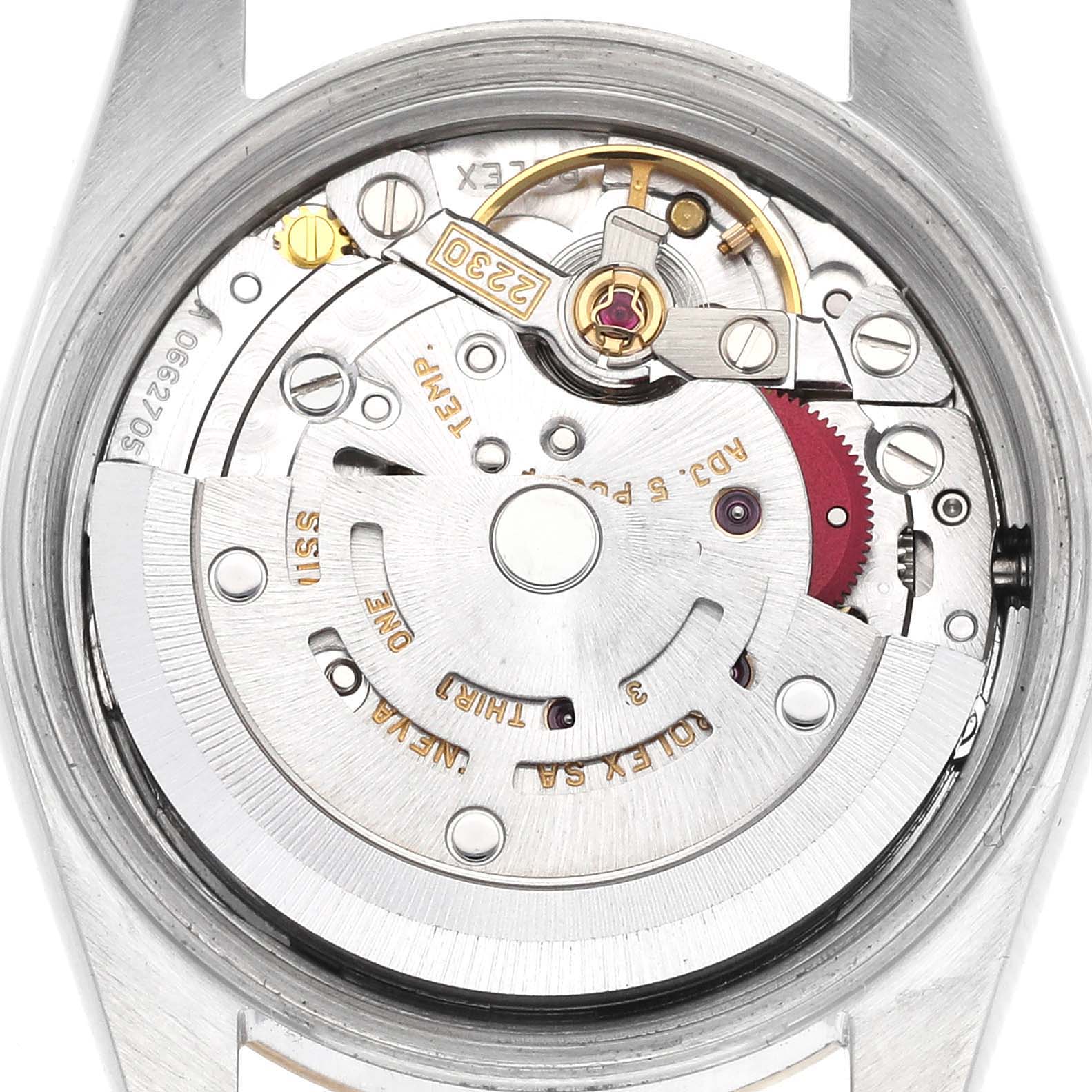 The image shows the back view of a Rolex Oyster Perpetual 76193 Women's Steel and Gold (two tone) Champagne Dial 76193 Women's Steel and Gold (two tone) Champagne Dial model watch, revealing its intricate internal movement components.