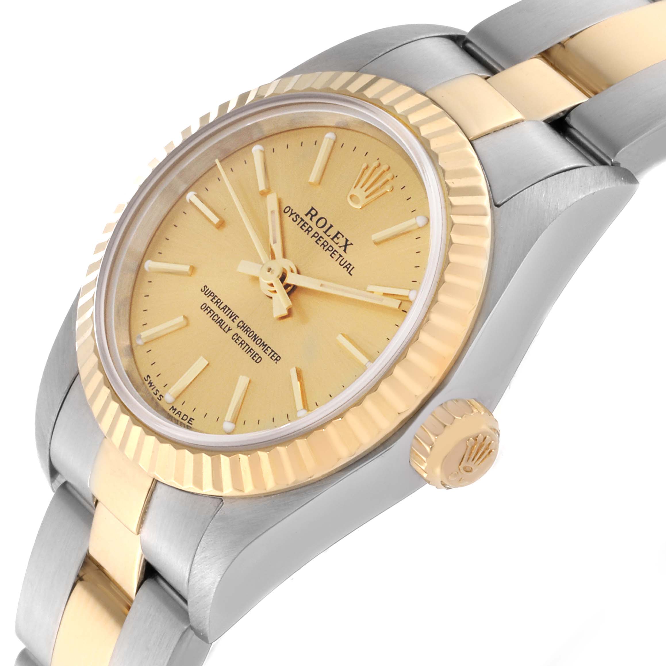 This image shows a close-up angle of the Rolex Oyster Perpetual 76193 Women's Steel and Gold (two tone) Champagne Dial 76193 Women's Steel and Gold (two tone) Champagne Dial watch, highlighting its dial, bezel, crown, and bracelet.