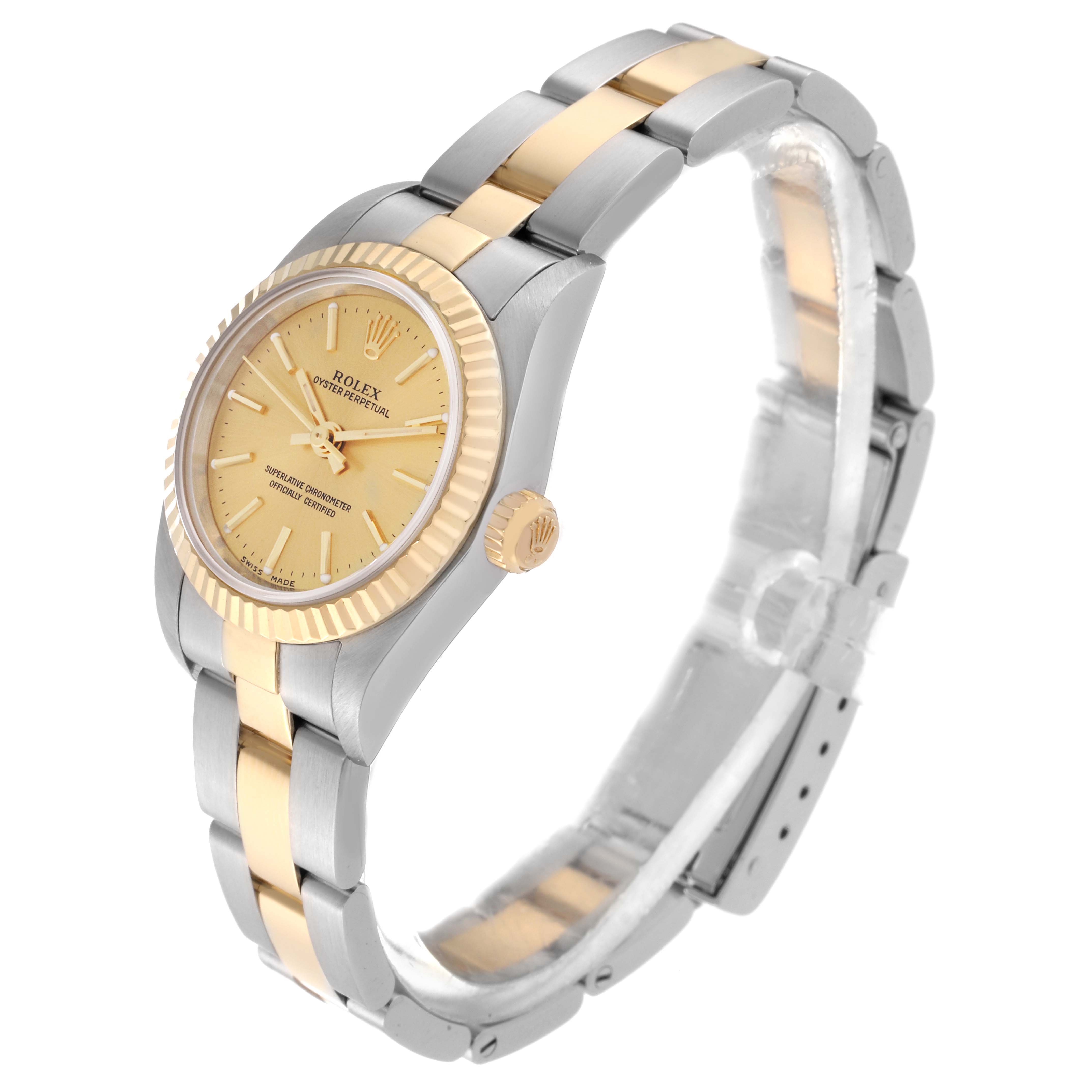 The Rolex Oyster Perpetual 76193 Women's Steel and Gold (two tone) Champagne Dial 76193 Women's Steel and Gold (two tone) Champagne Dial watch is shown at an angle, highlighting the stainless steel and gold bracelet, crown, and fluted bezel.