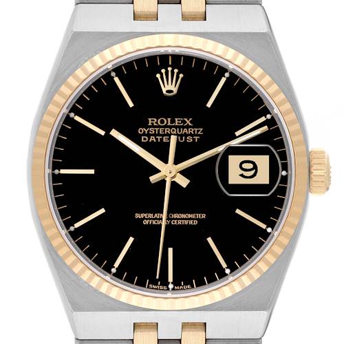 The image shows a front view of a Rolex Oysterquartz Datejust watch, highlighting its black dial, gold hour markers, and the date display.