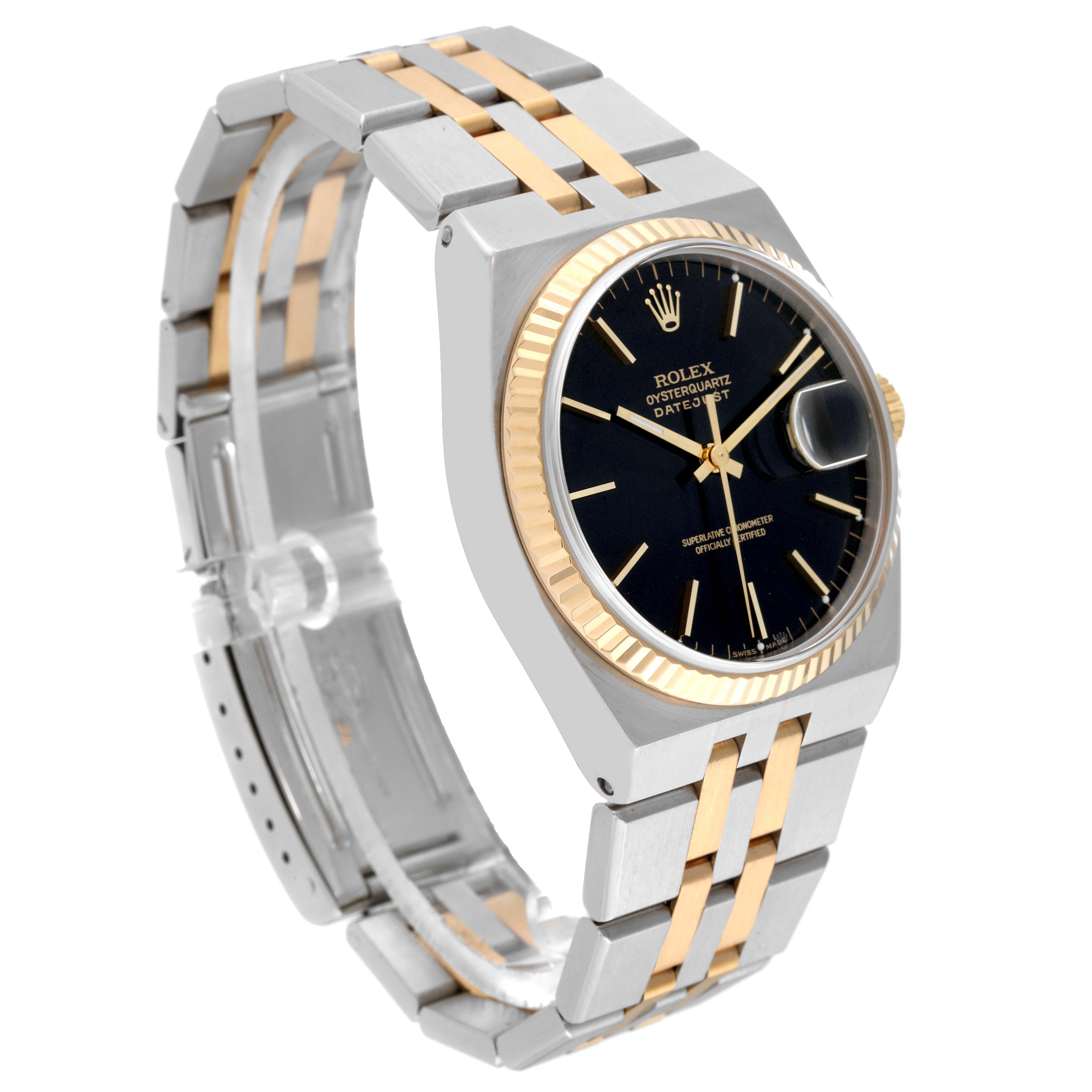 The Rolex Oysterquartz 17013 Men
s Steel and Gold (two tone) Black Dial 17013 Men
s Steel and Gold (two tone) Black Dial watch is shown at an oblique angle, displaying its bracelet, case, dial, and fluted bezel.
