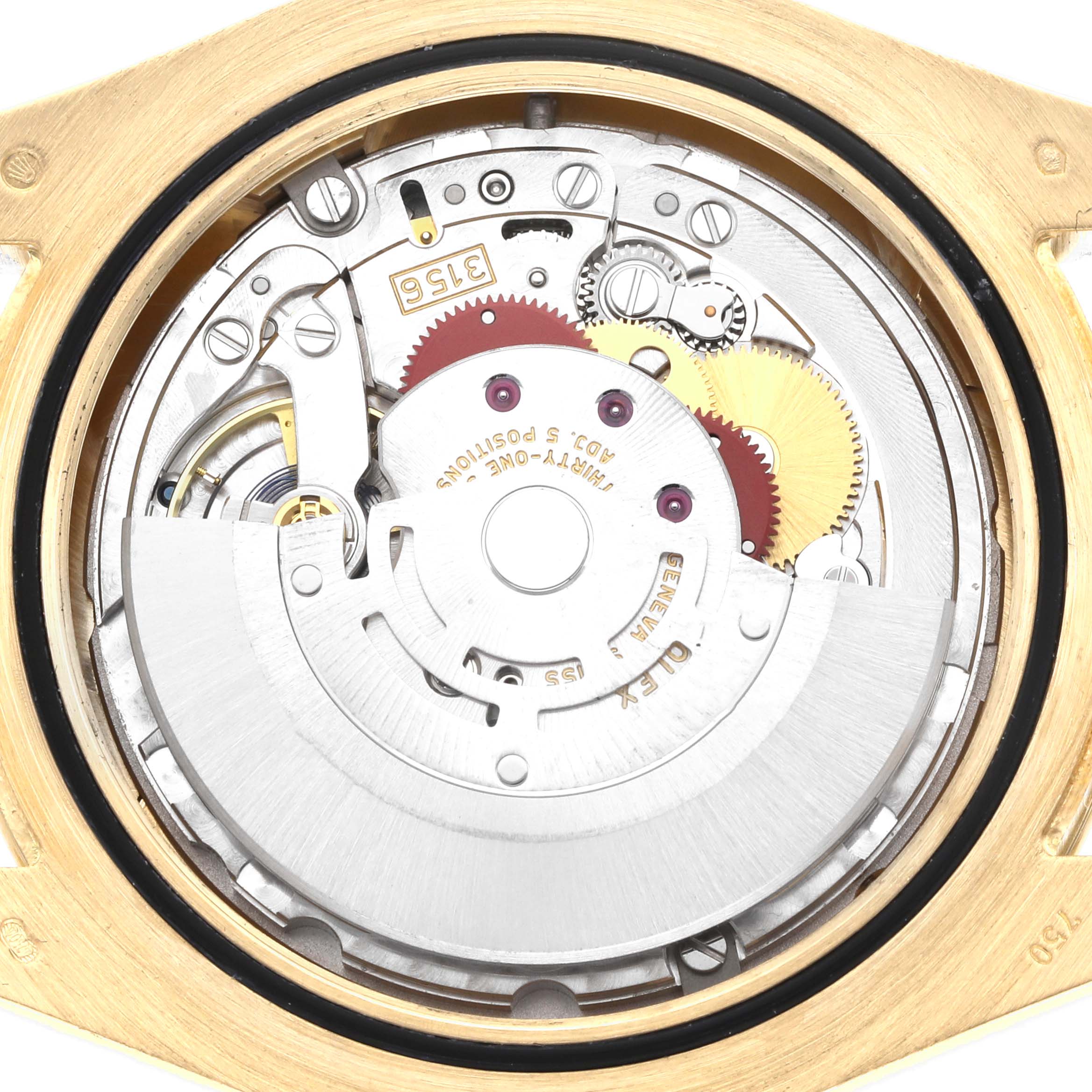 The image shows the internal movement of a Rolex President 218348 Men
s Yellow Gold Champagne Dial watch, viewed from the back, displaying gears and the rotor.
