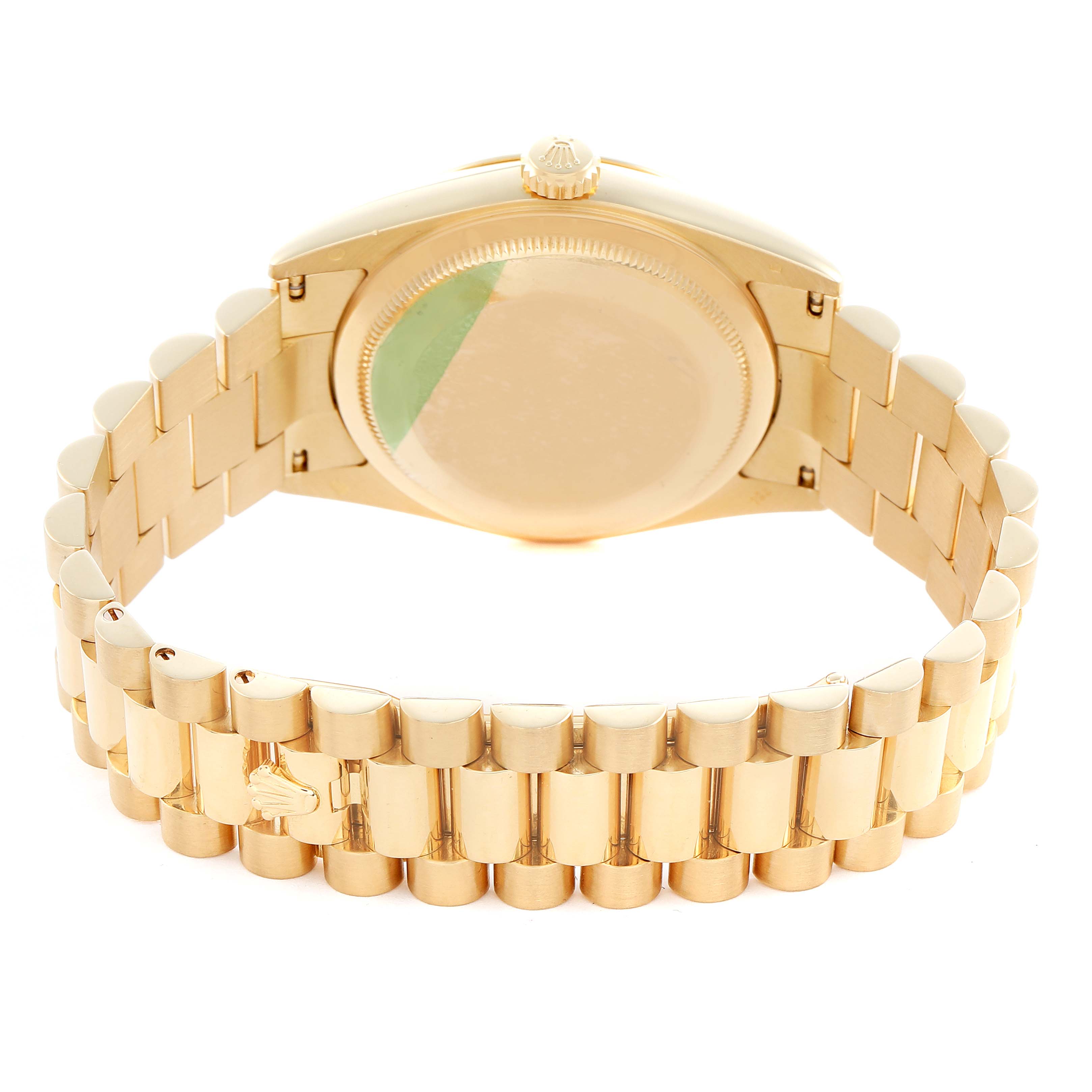 The Rolex President 118238 Men
s Yellow Gold Champagne Dial watch is shown from the back, highlighting the bracelet and caseback.