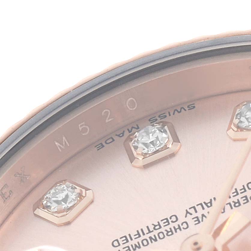 The image shows a close-up of the Rolex President 179175 Women
s Rose Gold Pink Dial watch face, highlighting diamond hour markers and the Swiss Made inscription.
