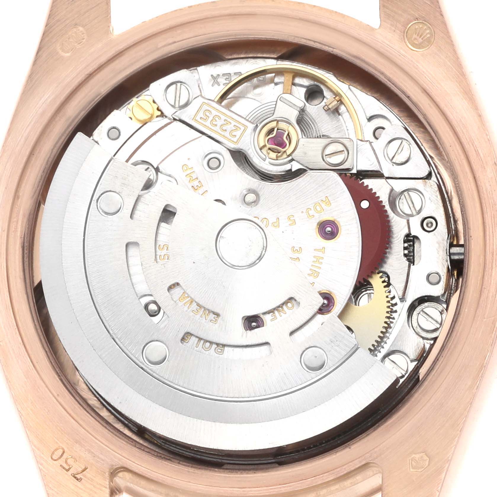 The image shows the movement of a Rolex President 179175 Women
s Rose Gold Pink Dial model from the back, highlighting the rotor and internal mechanics.