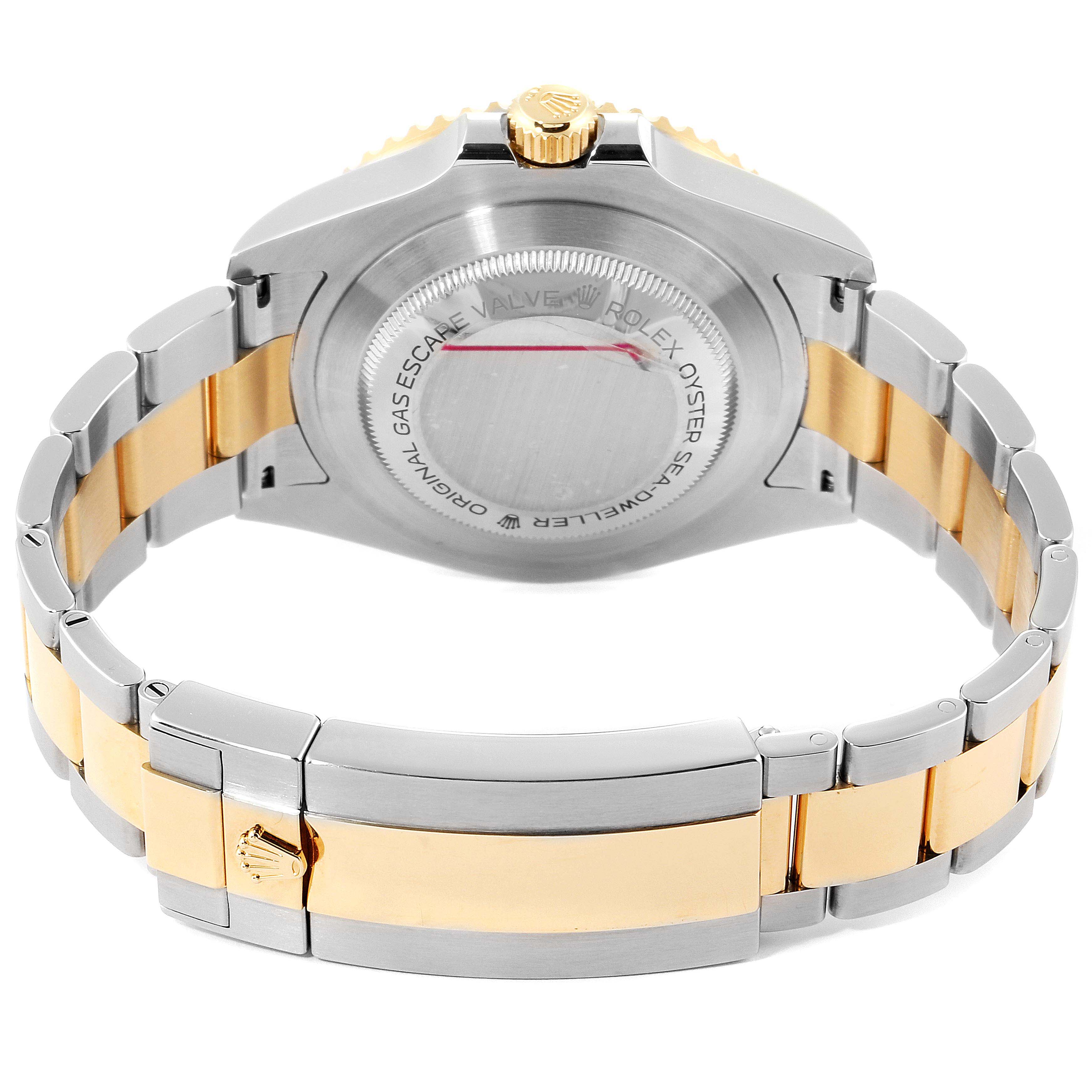 The image shows the back case and bracelet of a Rolex Sea-Dweller 126603 Men
s Steel and Gold (two tone) Black Dial 126603 Men
s Steel and Gold (two tone) Black Dial watch, highlighting its bi-metal design.