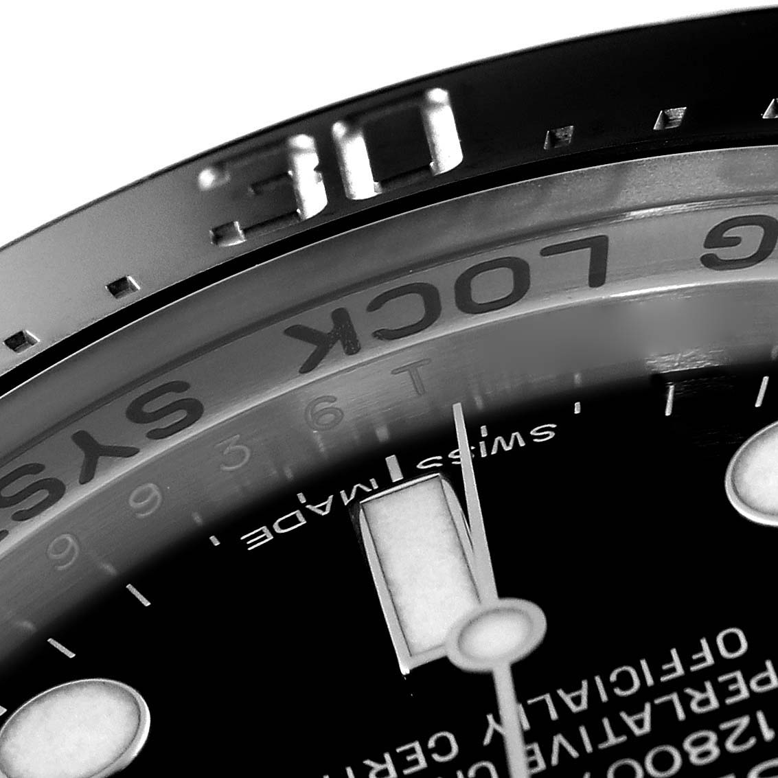 This close-up image of a Rolex Sea-Dweller 116660 Men
s Stainless Steel Black Dial 116660 Men
s Stainless Steel Black Dial watch shows part of the bezel, dial, and hands from an angled perspective.