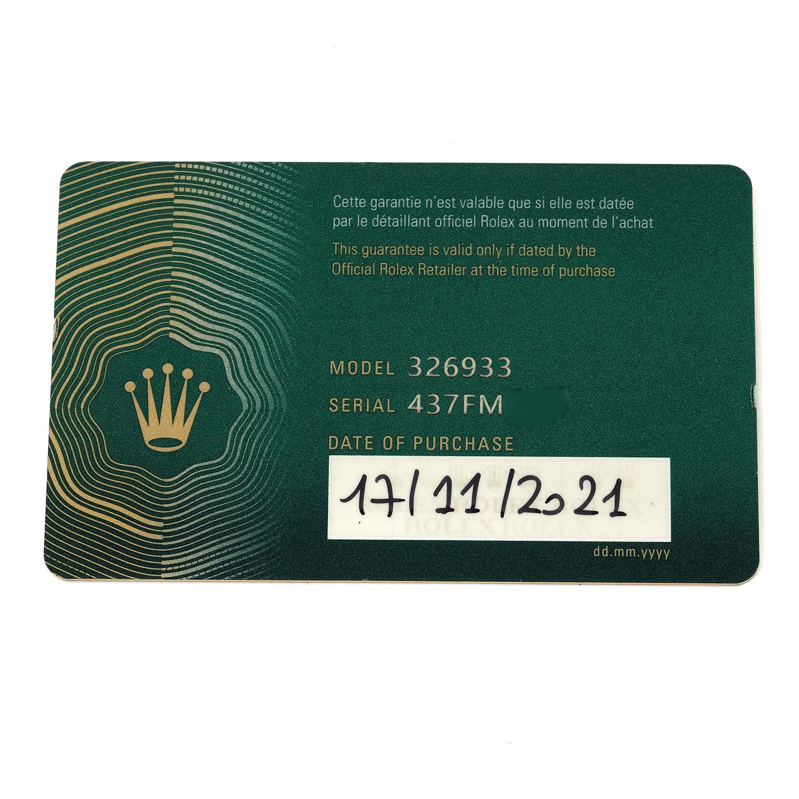 The image shows a warranty card for the Rolex Sky-Dweller 3269333 Men
s Steel and Gold (two tone) Champagne Dial, displaying model and serial numbers.