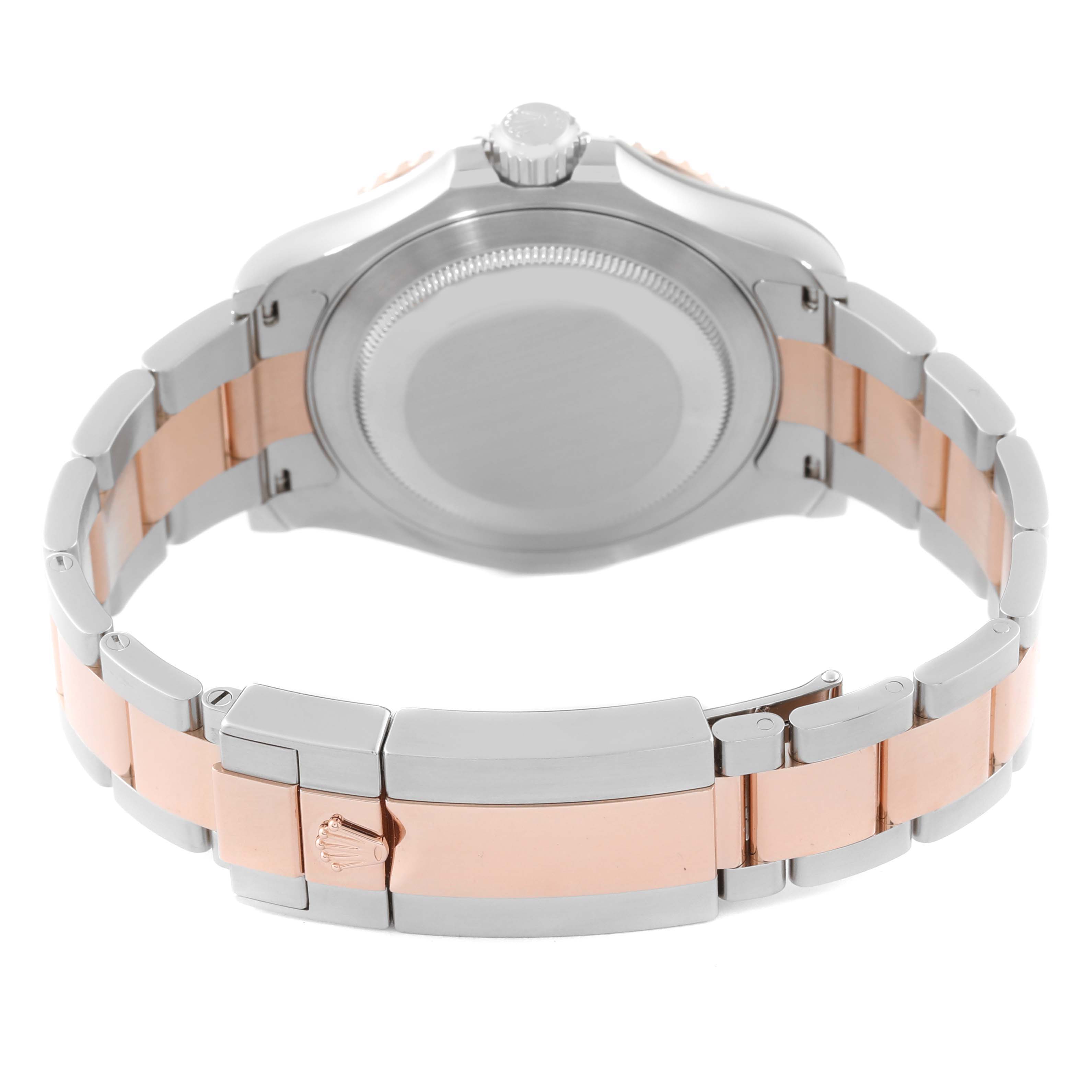 The Rolex Yacht-Master 126621 Men's Steel and Gold (two tone) Brown Dial 126621 Men's Steel and Gold (two tone) Brown Dial is shown from the back, highlighting its case back, crown, and two-tone bracelet.