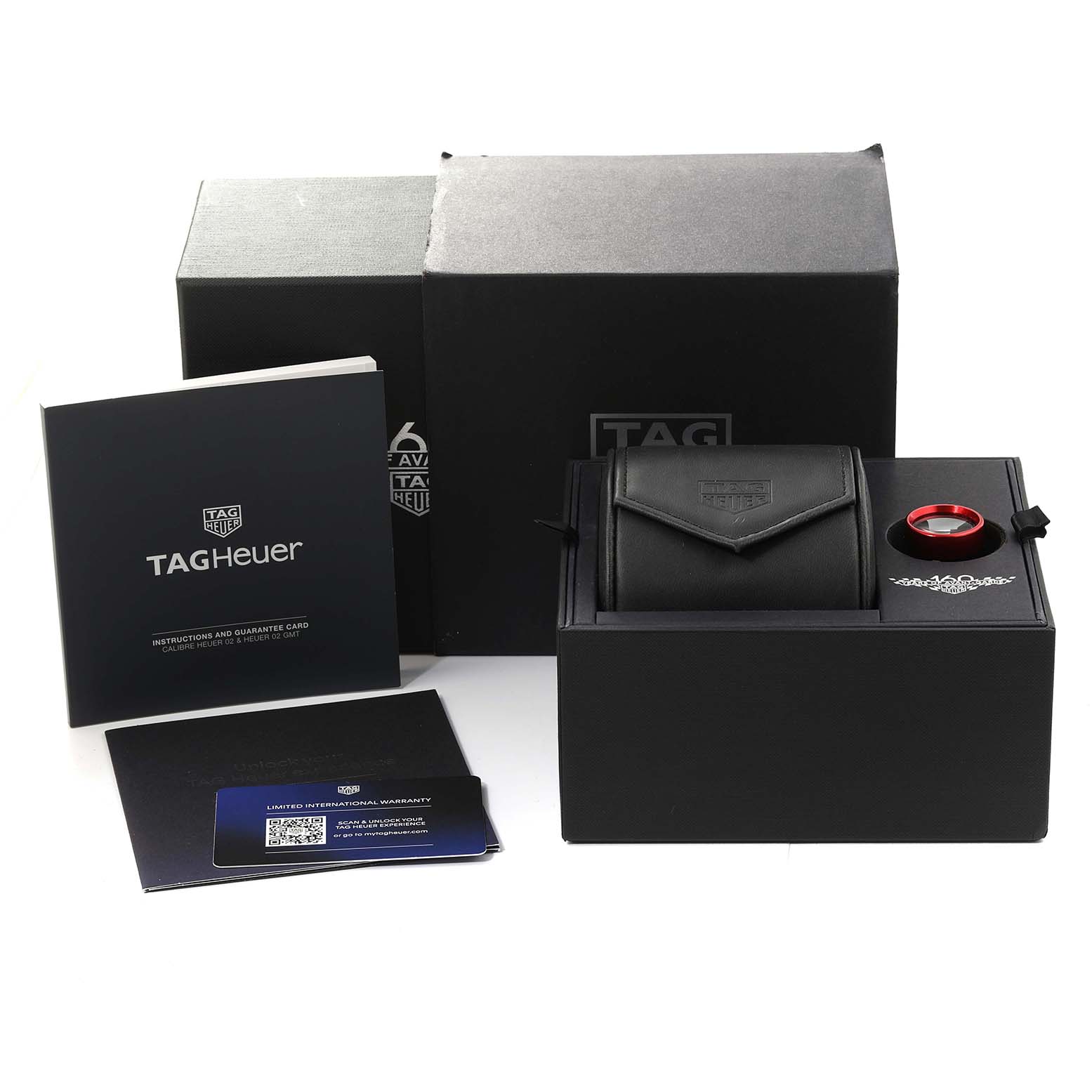 The image shows the packaging, instruction booklet, warranty card, and accessories of the Tag Heuer Carrera CBK221C.FC6488 Men's Stainless Steel White Dial CBK221C.FC6488 Men's Stainless Steel White Dial model watch.