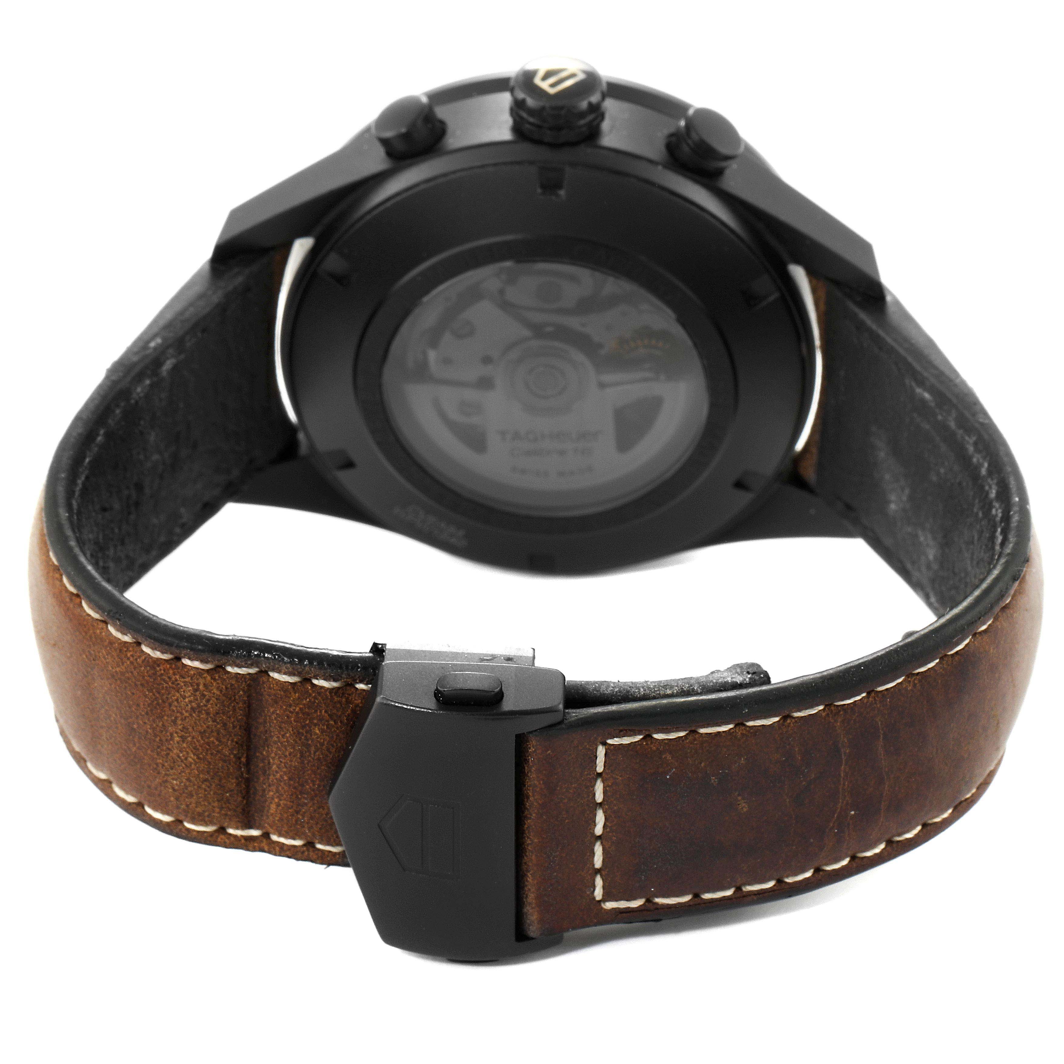 This image shows the back view of a Tag Heuer Carrera CV2A84.FC6394 Men's Titanium Black Dial CV2A84.FC6394 Men's Titanium Black Dial watch, highlighting the case back, leather strap, and clasp.