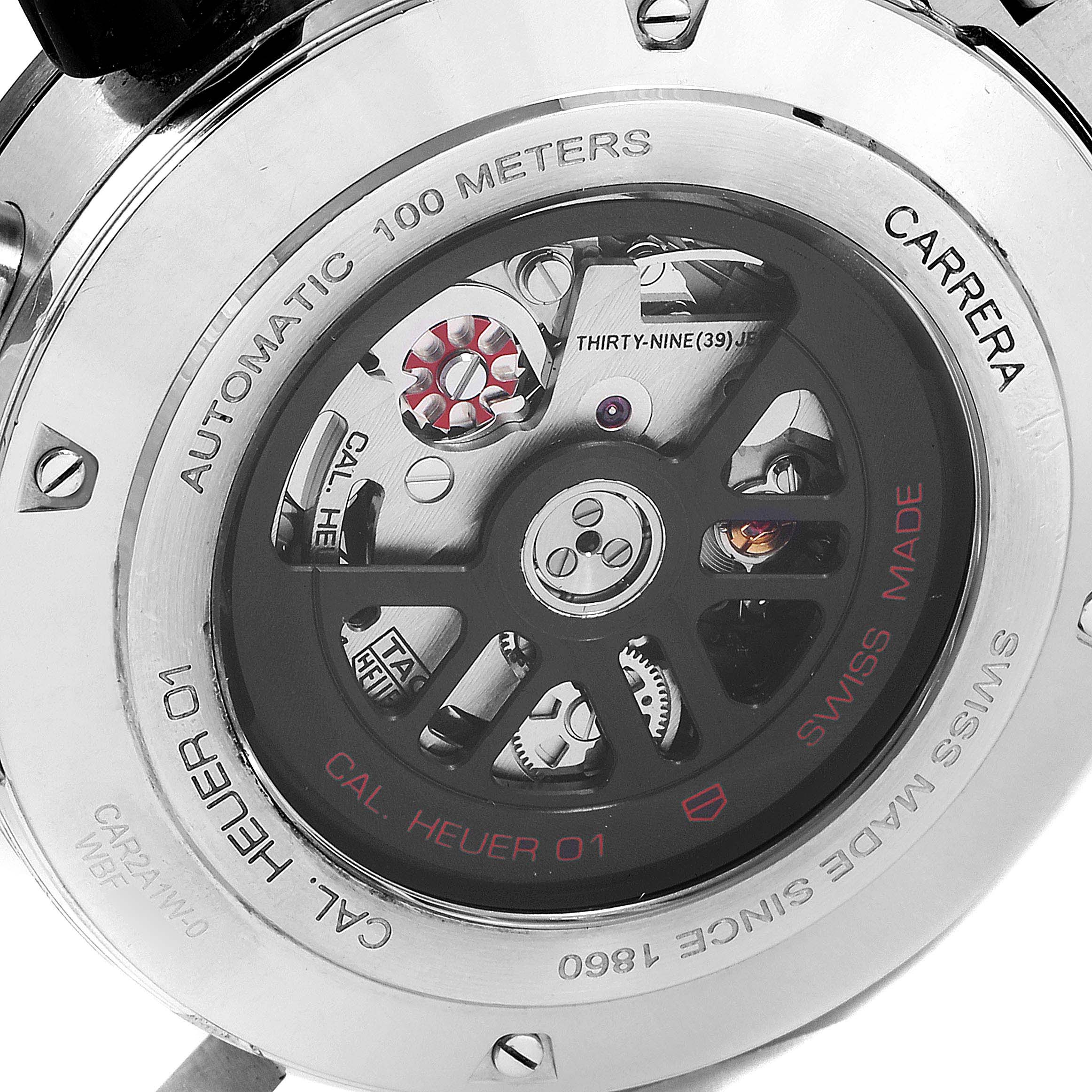 The image shows the back of a Tag Heuer Carrera CAR2A1W.BA0703 Men's Stainless Steel Transparent Dial CAR2A1W.BA0703 Men's Stainless Steel Transparent Dial watch, displaying the internal mechanism and engraving details.