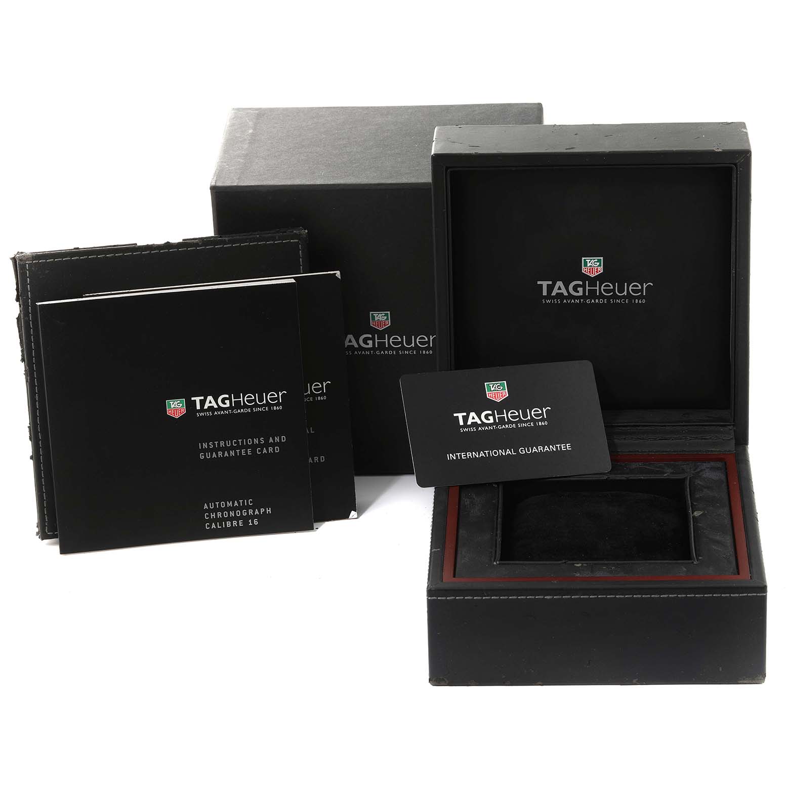 The image shows the packaging, manuals, and a guarantee card for a Tag Heuer Limited Edition CV2A1F.BA0796 Men
s Stainless Steel Black Dial CV2A1F.BA0796 Men
s Stainless Steel Black Dial watch.