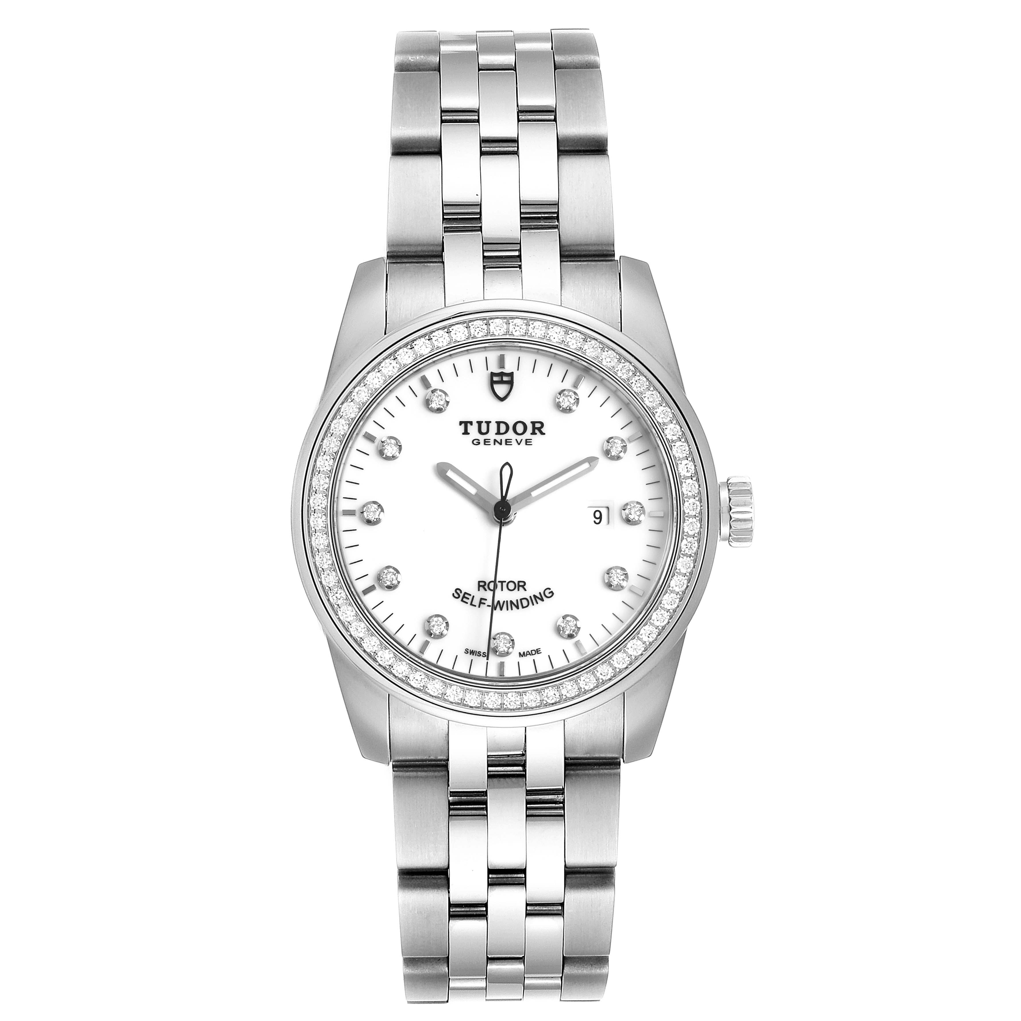 The image shows a front view of the Tudor Glamour M53020-0074 Women's Stainless Steel White Dial M53020-0074 Women's Stainless Steel White Dial model watch, displaying the dial, bezel, and stainless steel bracelet.