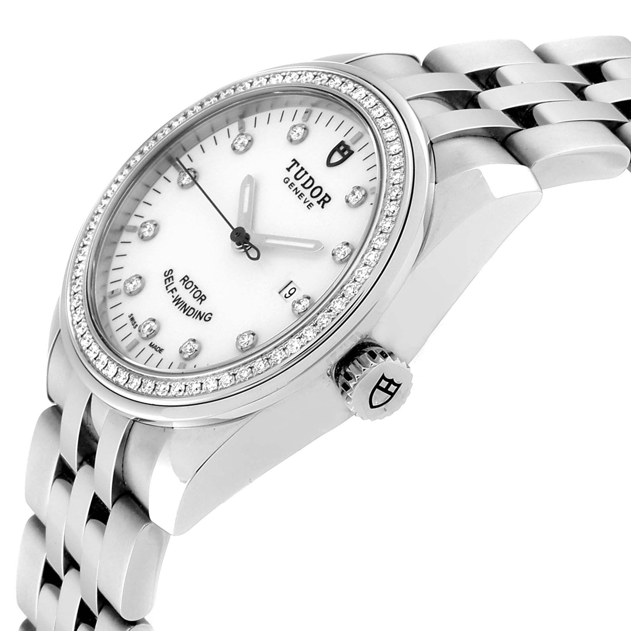 This image shows a Tudor Glamour M53020-0074 Women's Stainless Steel White Dial M53020-0074 Women's Stainless Steel White Dial watch at an angled top side view, highlighting the bezel, dial, crown, and part of the bracelet.