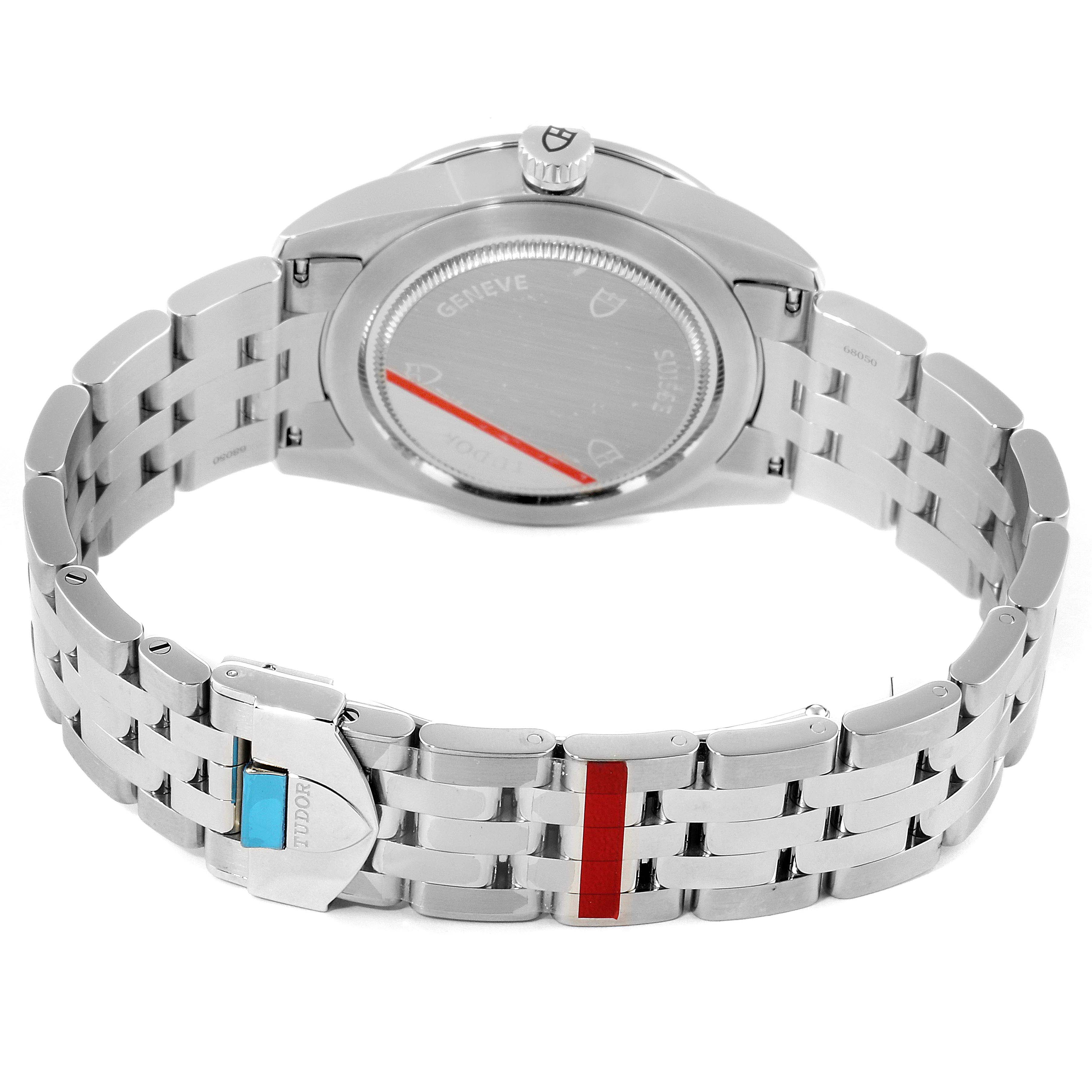 The image shows the back and bracelet of a Tudor Glamour M55000-0007 Men's Stainless Steel Black Dial M55000-0007 Men's Stainless Steel Black Dial watch, highlighting the clasp and case back.