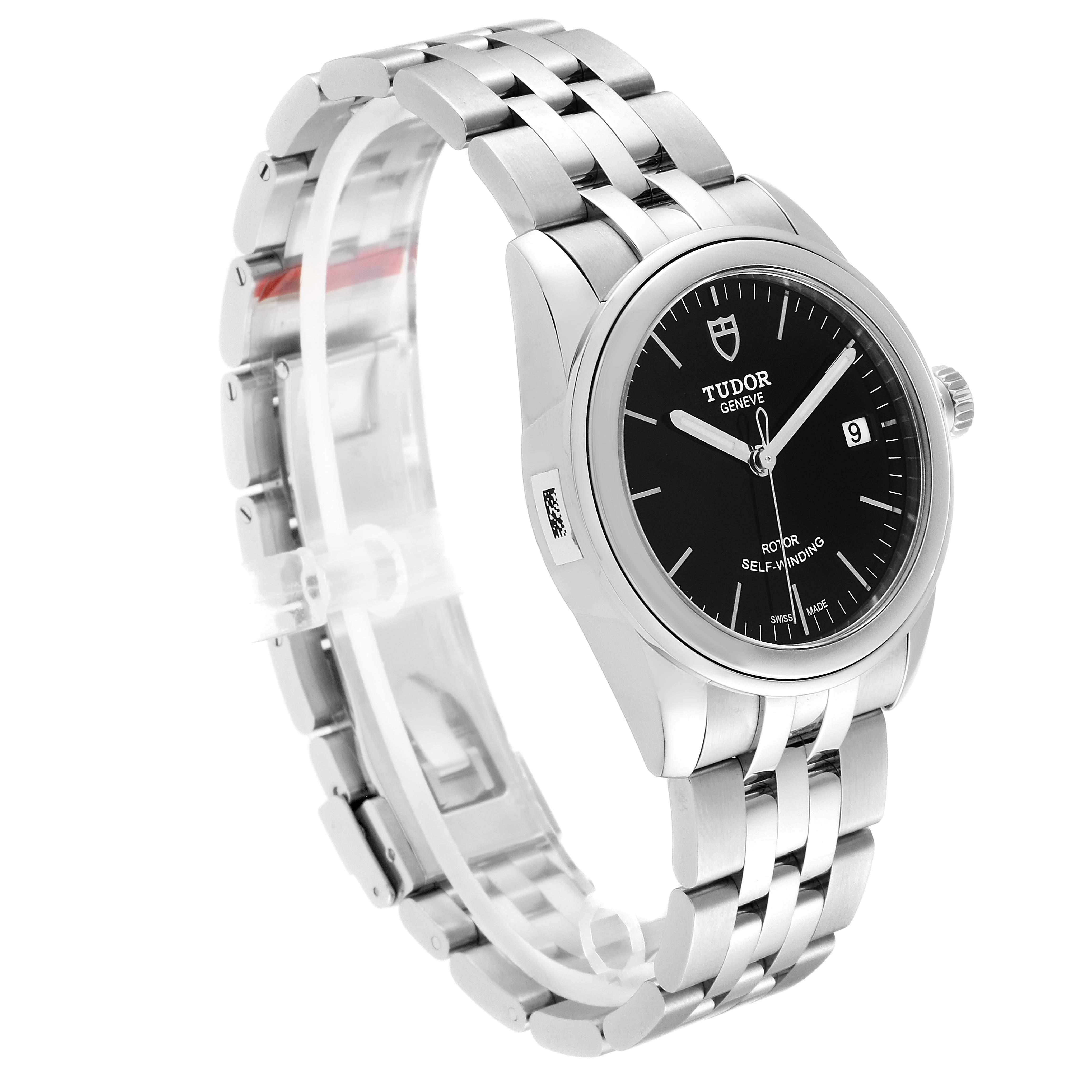 The Tudor Glamour M55000-0007 Men's Stainless Steel Black Dial M55000-0007 Men's Stainless Steel Black Dial watch is shown from a three-quarter angle, highlighting the dial, case, bracelet, and crown.