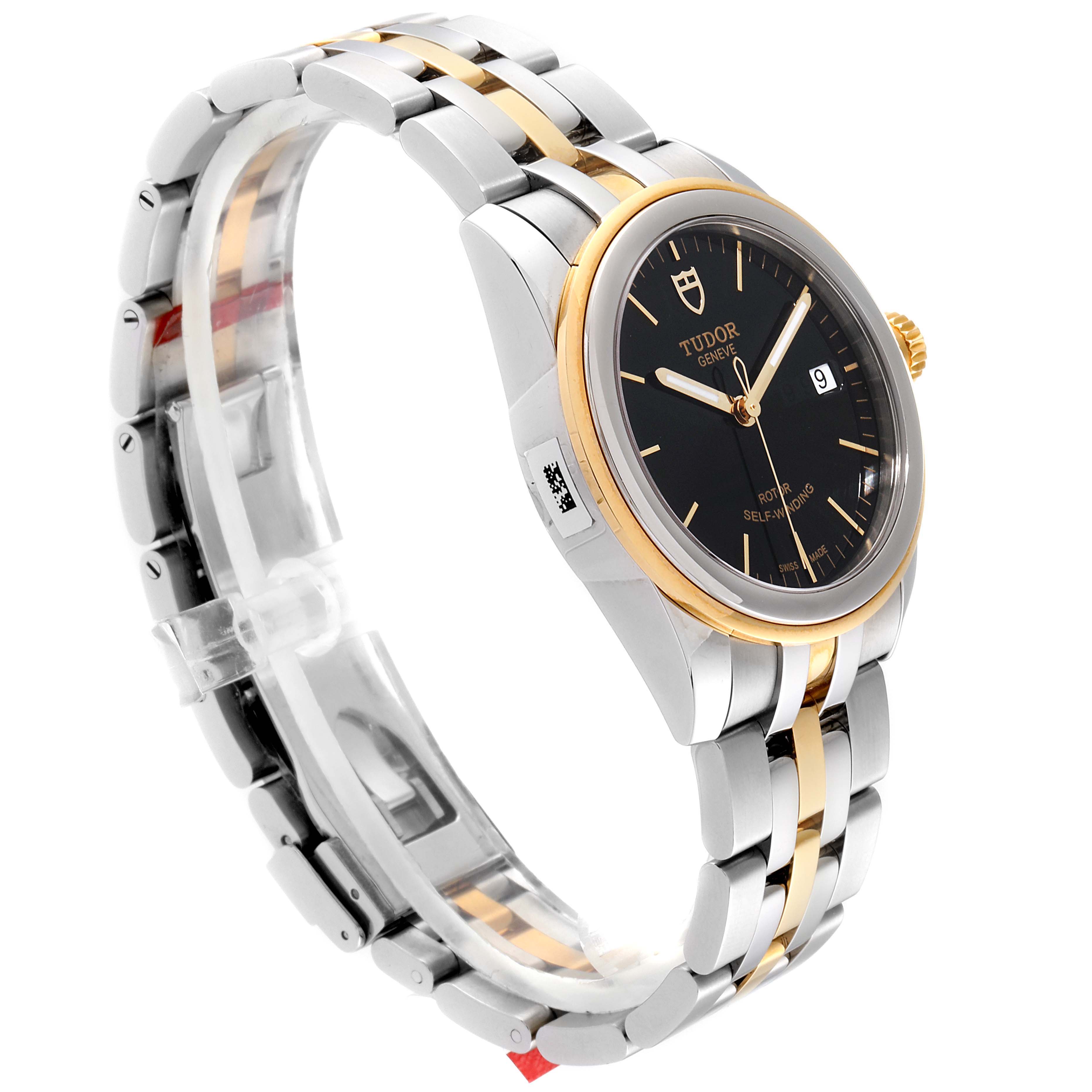 The Tudor Glamour 55003-0007 Men's Steel and Gold (two tone) Black Dial 55003-0007 Men's Steel and Gold (two tone) Black Dial watch is shown at a side angle, highlighting the black dial, two-tone bracelet, and date window.