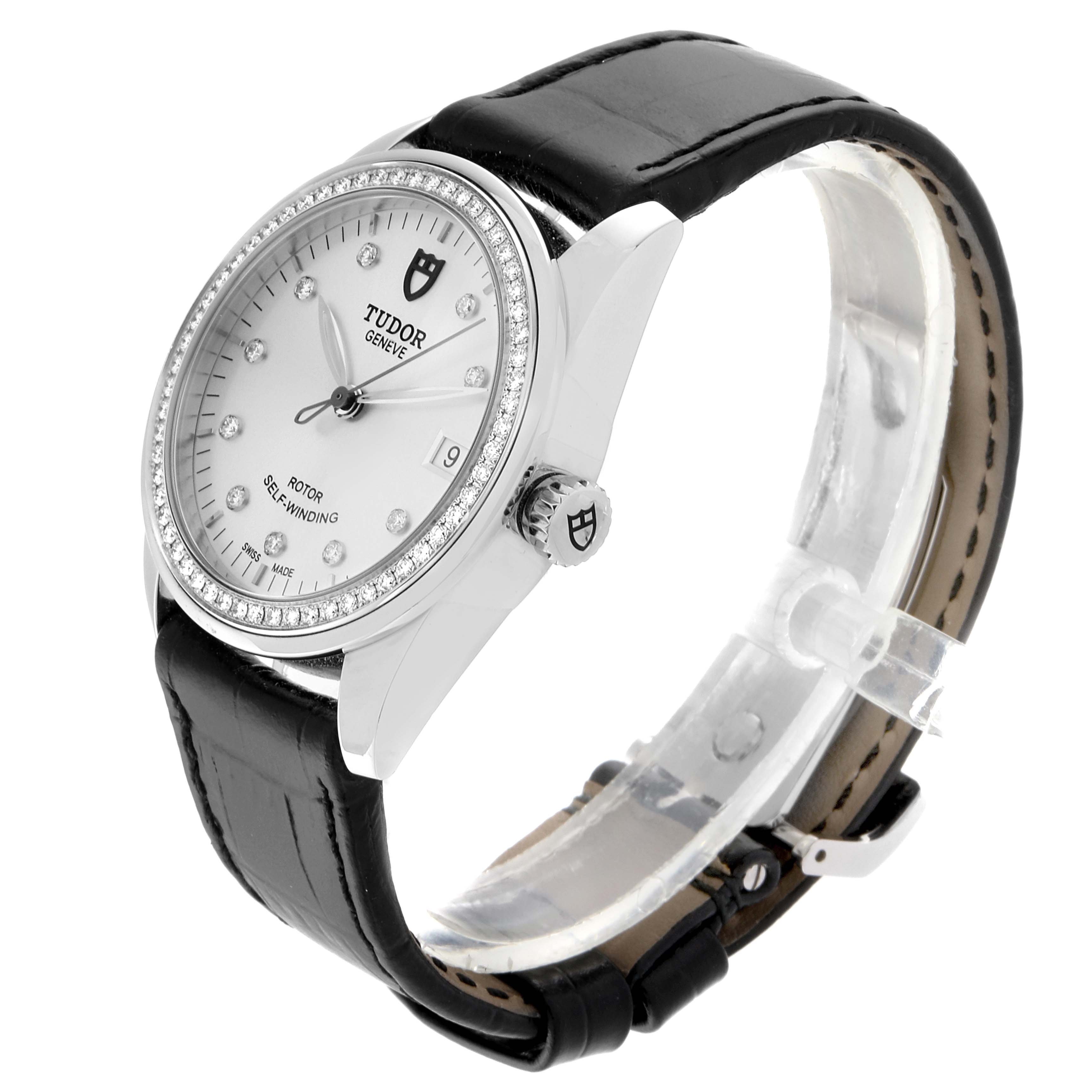 The Tudor Glamour M55020-0057 Men's Stainless Steel Silver Dial M55020-0057 Men's Stainless Steel Silver Dial watch is shown at a three-quarter angle, displaying the dial, bezel, crown, and black leather strap.