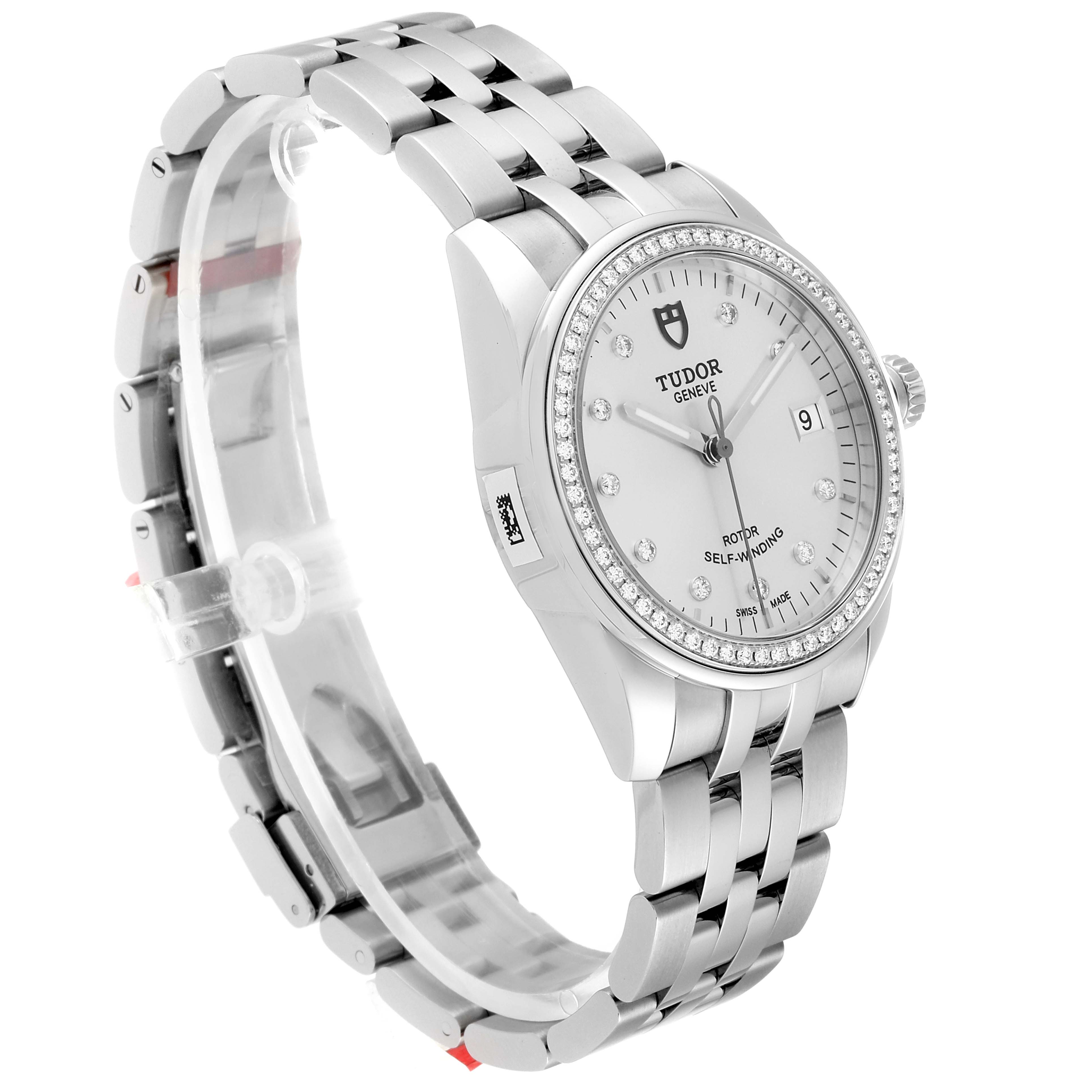 The Tudor Glamour M55020-0003 Men
s Stainless Steel Silver Dial M55020-0003 Men
s Stainless Steel Silver Dial watch is shown from a left-side angle, featuring the bracelet, dial, bezel, and crown.