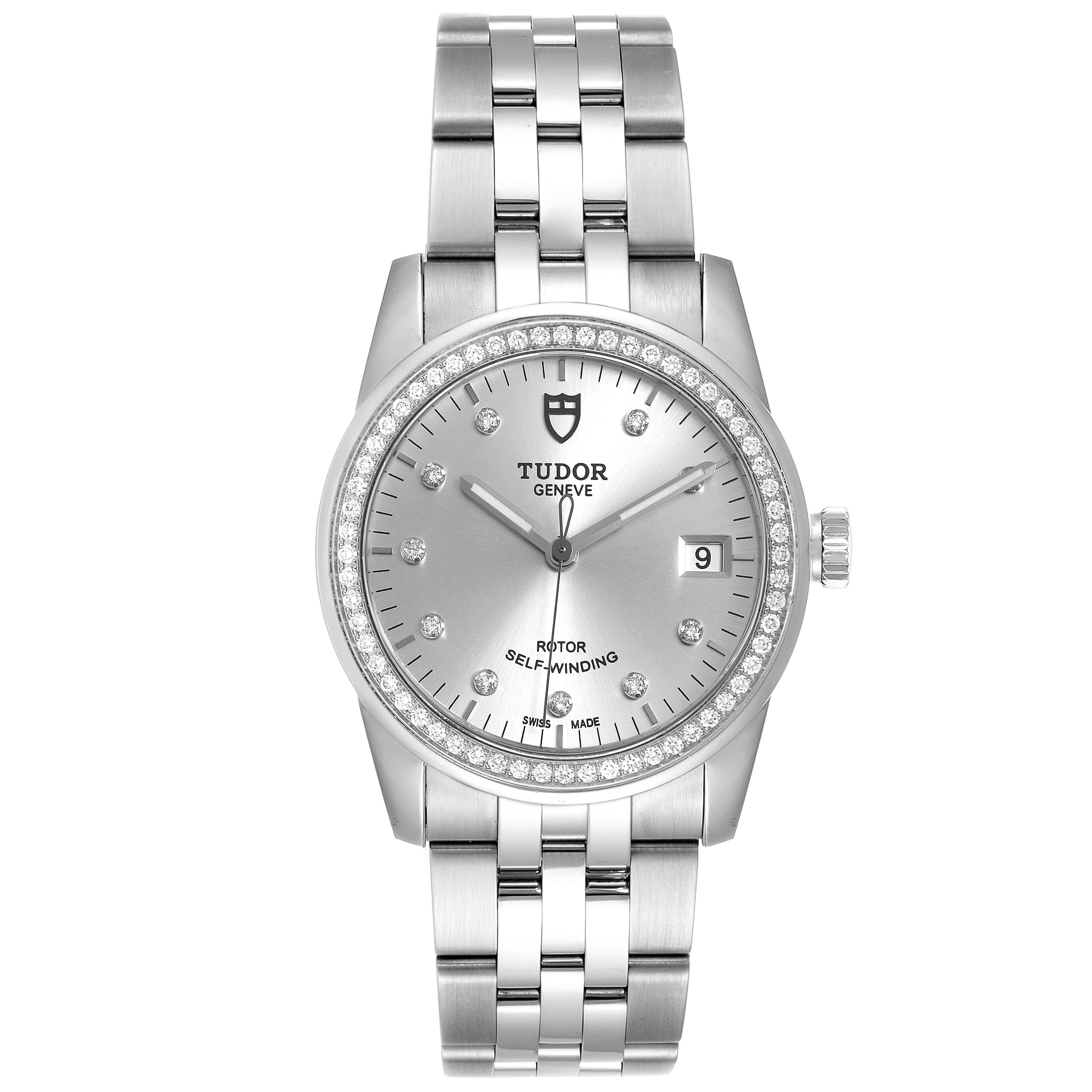 This Tudor Glamour M55020-0003 Men
s Stainless Steel Silver Dial M55020-0003 Men
s Stainless Steel Silver Dial watch is shown from a front angle, displaying its face, dial, bezel, crown, and bracelet.