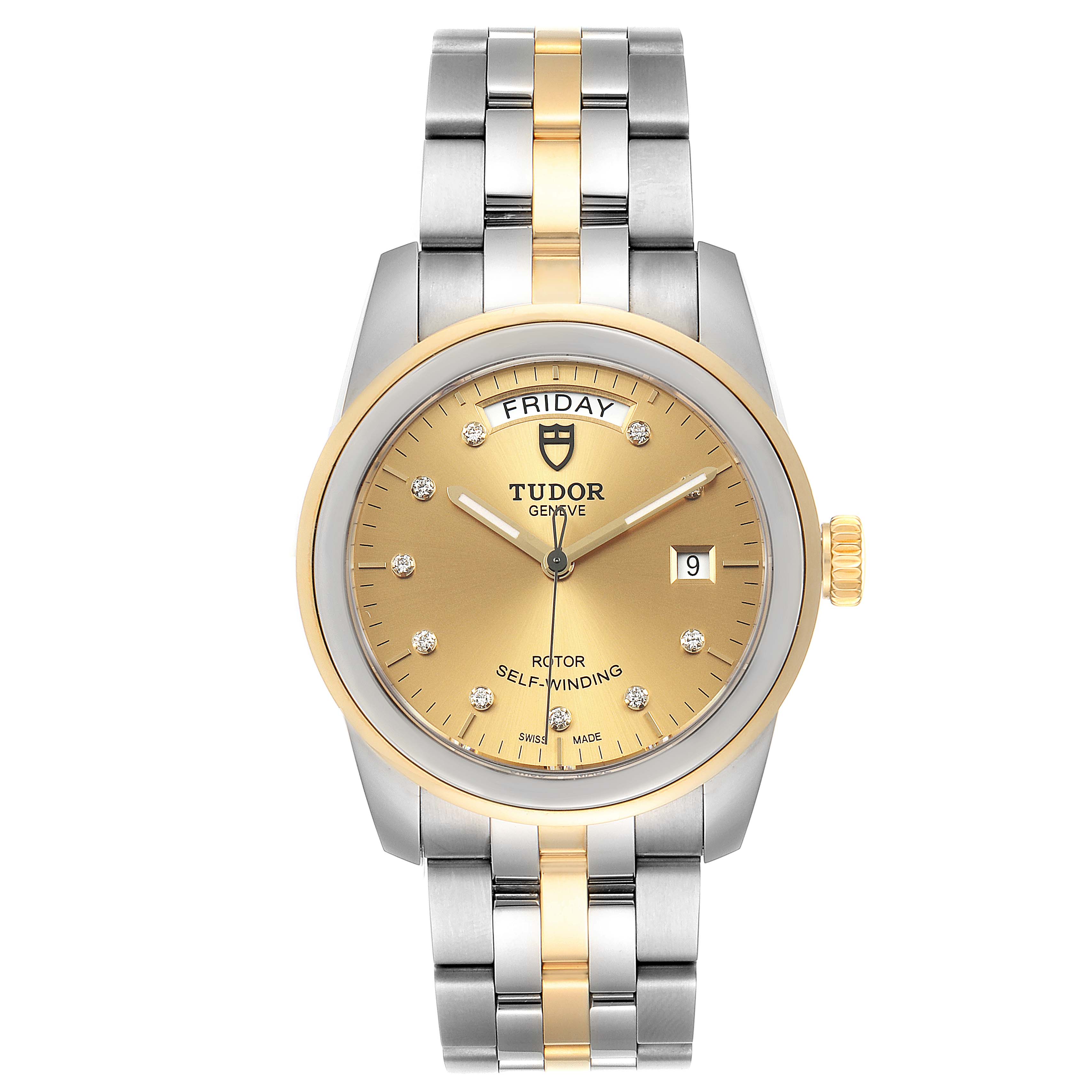 This image displays a front view of a Tudor Glamour 56003-0006 Men's Steel and Gold (two tone) Champagne Dial 56003-0006 Men's Steel and Gold (two tone) Champagne Dial model watch featuring a two-tone metal bracelet and a gold dial with a day-date display.