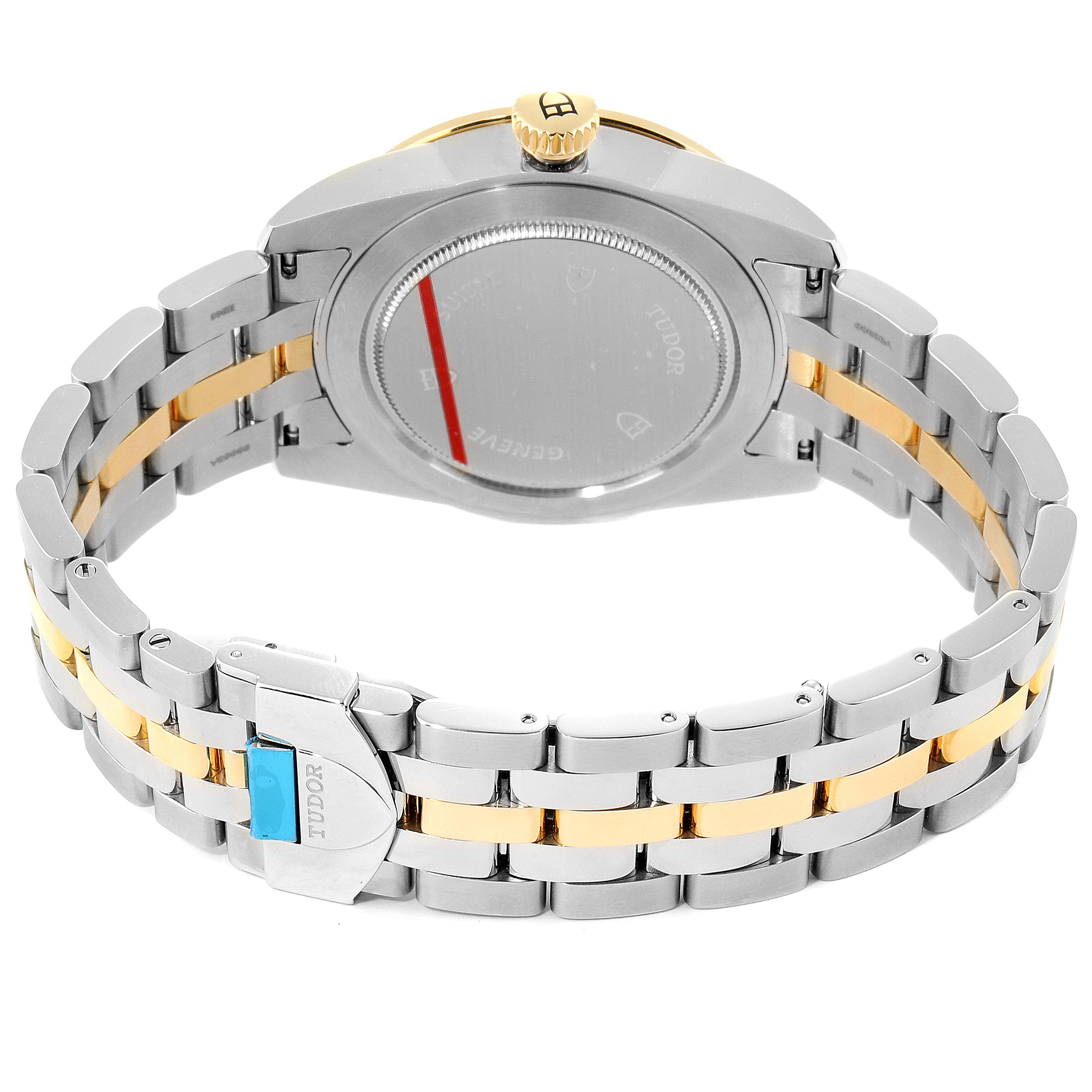 The image shows the back view of a Tudor Glamour 56003-0006 Men's Steel and Gold (two tone) Champagne Dial 56003-0006 Men's Steel and Gold (two tone) Champagne Dial model watch, highlighting the case back, bracelet, and clasp.