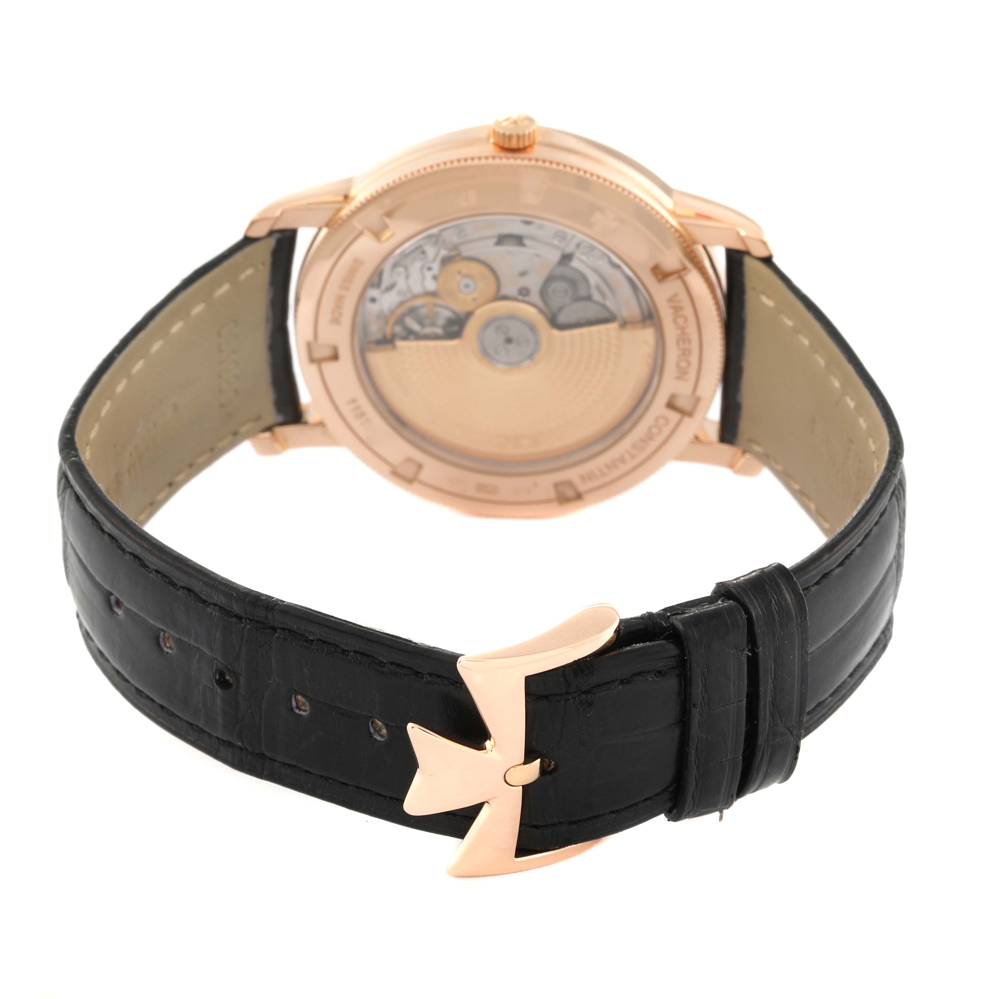 The image shows the back view of a Vacheron Constantin Traditionnelle 87172/000R Men's Rose Gold Black Dial 87172/000R Men's Rose Gold Black Dial watch, highlighting its black leather strap and visible movement mechanism.