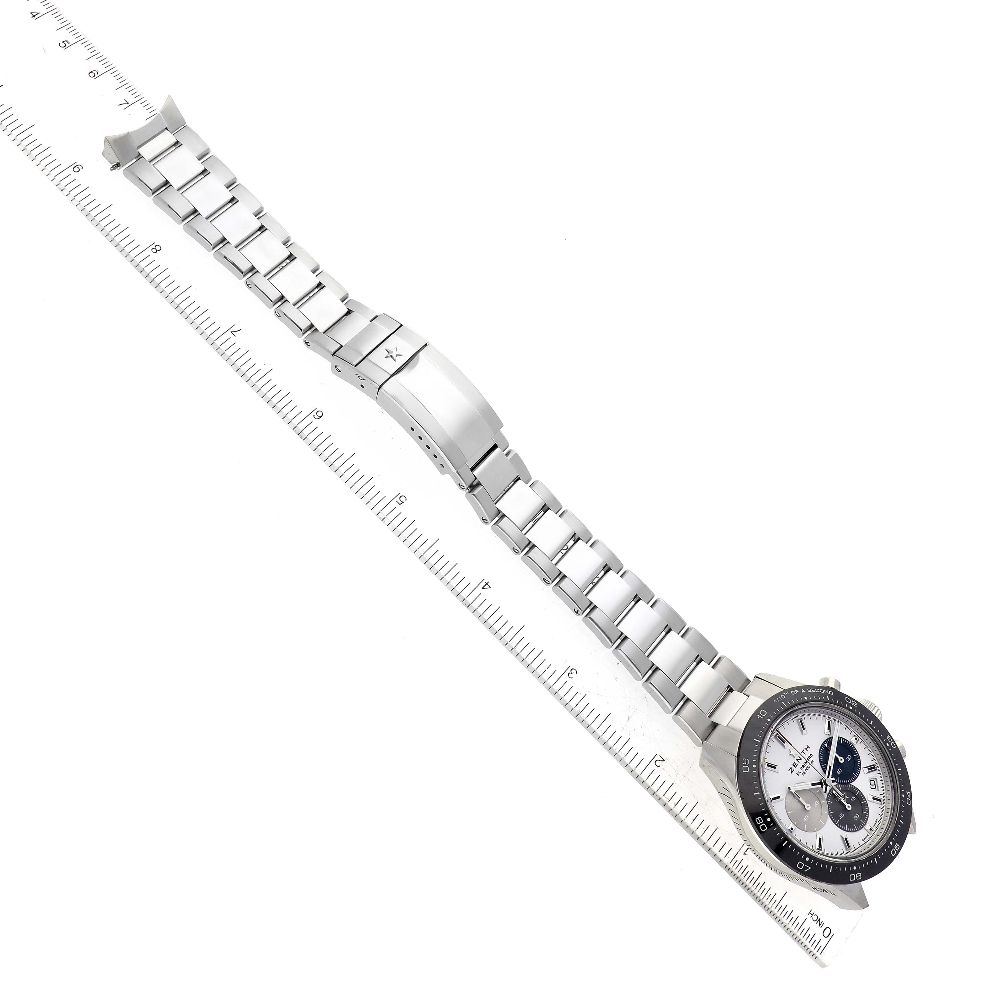 The image shows a Zenith Chronomaster 03.3100.3600/69.M3100 Men
s Stainless Steel White Dial 03.3100.3600/69.M3100 Men
s Stainless Steel White Dial watch at a top-down angle, displaying the full face and entire metal bracelet.