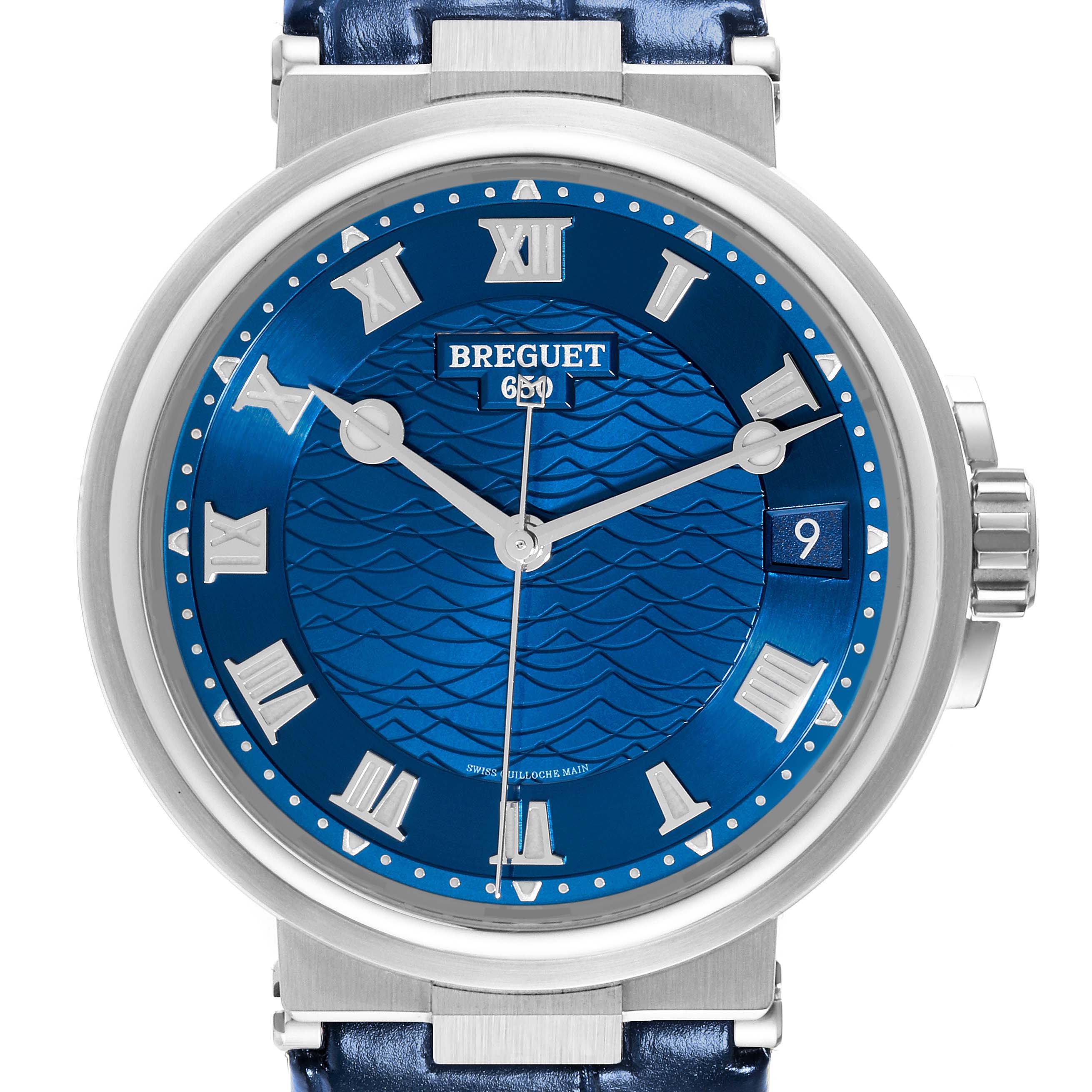 The image shows a front view of the Breguet Marine 5517BB/Y2/9ZU Men's White Gold Blue Dial 5517BB/Y2/9ZU Men's White Gold Blue Dial model watch, highlighting its blue dial, Roman numerals, and date window.